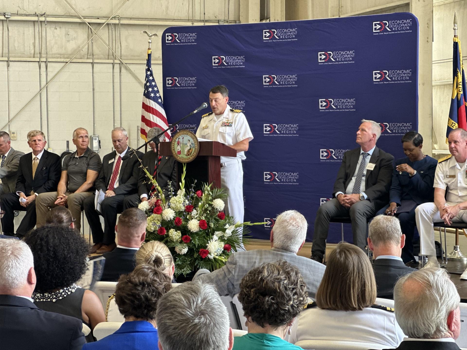 Fleet Readiness Center East (FRCE) Commanding Officer Capt. James Belmont delivers remarks during the groundbreaking ceremony at the North Carolina Global TransPark in Kinston, North Carolina June 25. This innovative partnership between the state of North Carolina and FRCE is the first of its kind within the Department of the Navy. 