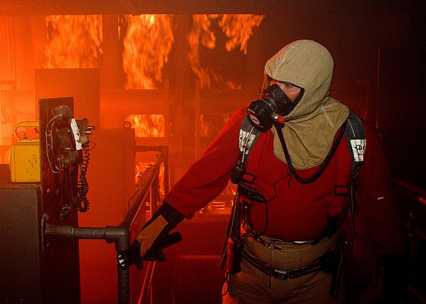 An instructor directs damage control students The Fire Fighter Trainer