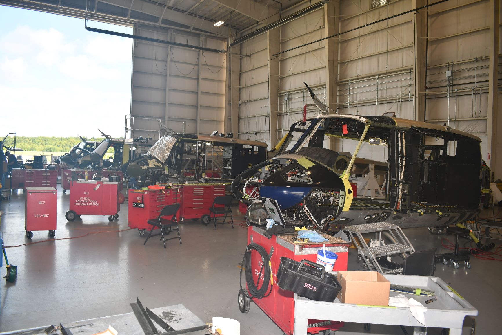 UH-1N helicopters in hangar