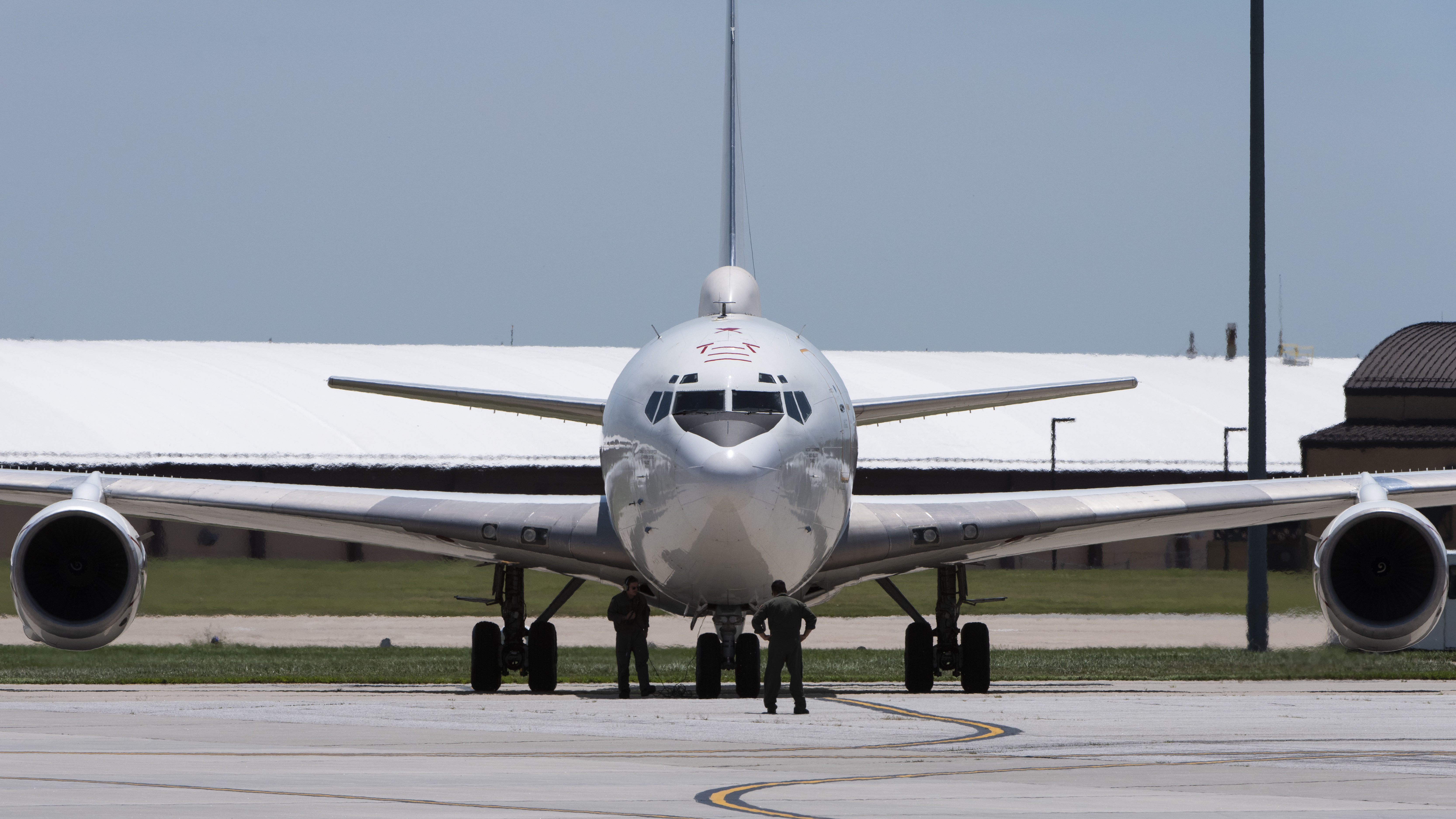 A U.S. Navy E-6B Mercury aircraft receives post-flight maintenance after landing at Offutt AFB, Nebraska.