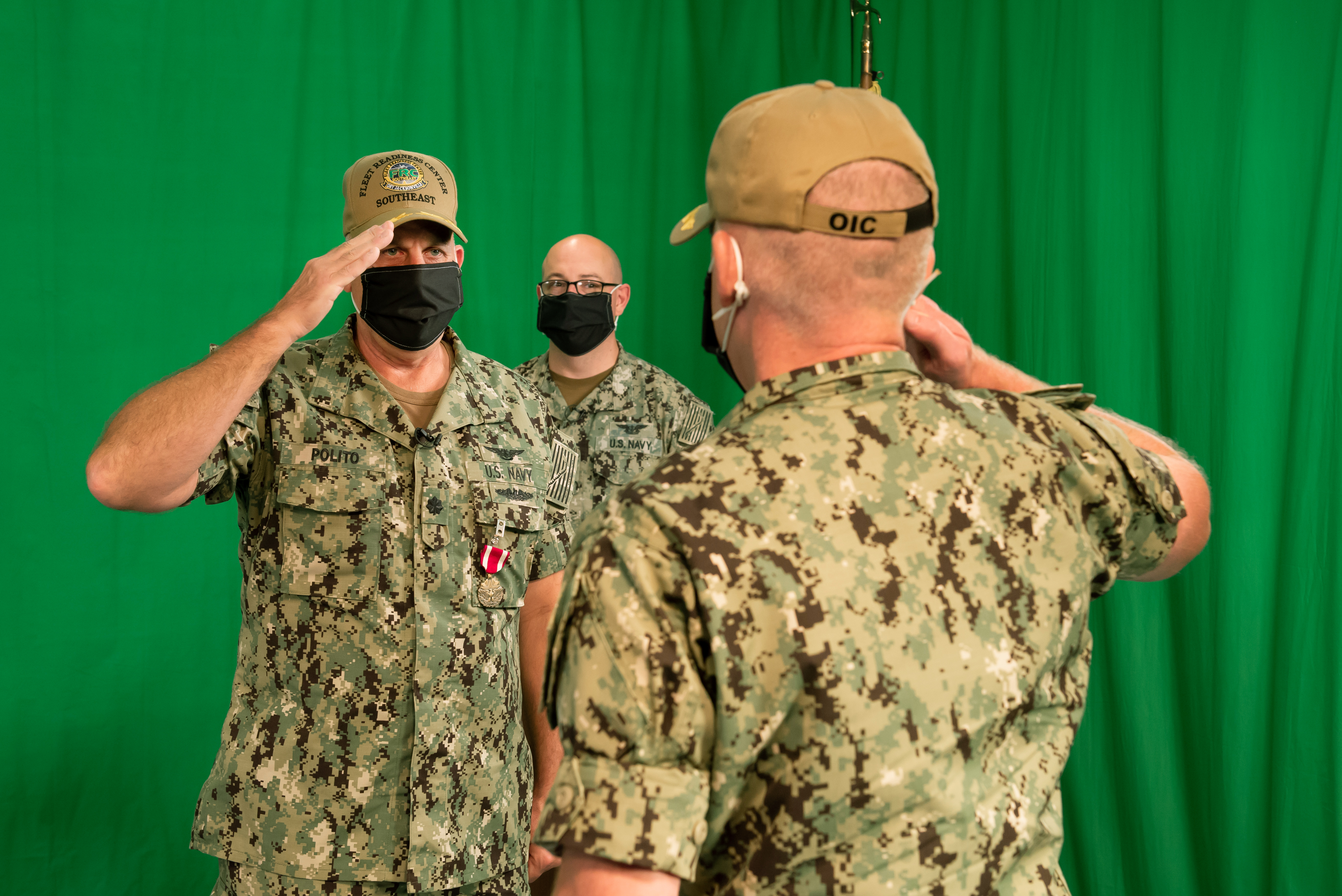 ACKSONVILLE, Fla. (May 21, 2020) Cmdr. Wilfred Judd III (right) accepts his new position as Officer in Charge (OIC), Fleet Readiness Center Southeast Det. Jacksonville.