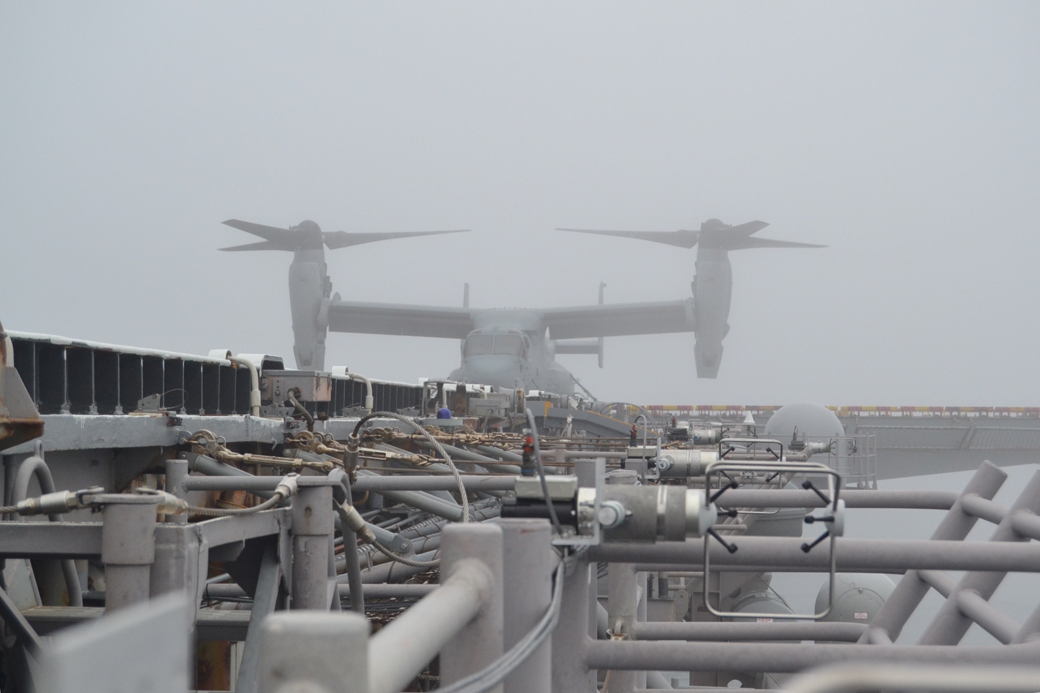 Poor visibility prevented flight test operations for the first few days of Air Test and Evaluation Squadron (HX) 21’s detachment aboard the USS Wasp (LHD 1) in late May and early June to conduct a series of test flights intended to demonstrate the efficacy of a new flight control response for shipboard operations by MV-22 Osprey. (U.S. Navy photo by Eric Hayden)