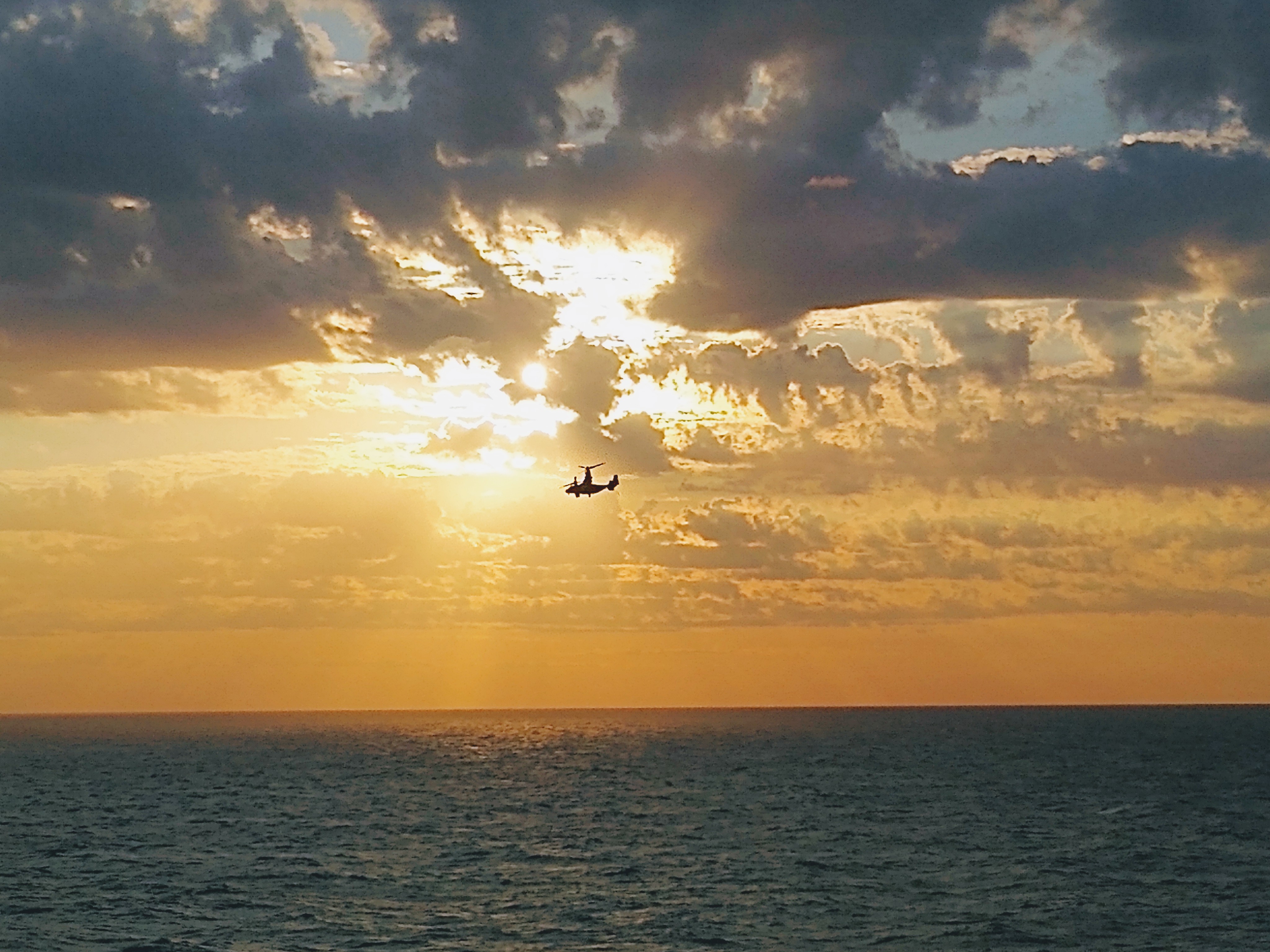 An MV-22 Osprey flies near the USS Wasp (LHD 1) as part of a series of flight tests conducted by a detachment of military and civilian personnel from Air Test and Evaluation Squadron (HX) 21 to validate a new flight control capability for MV-22s operating from ships. (U.S. Navy photo by Pat Murphy)