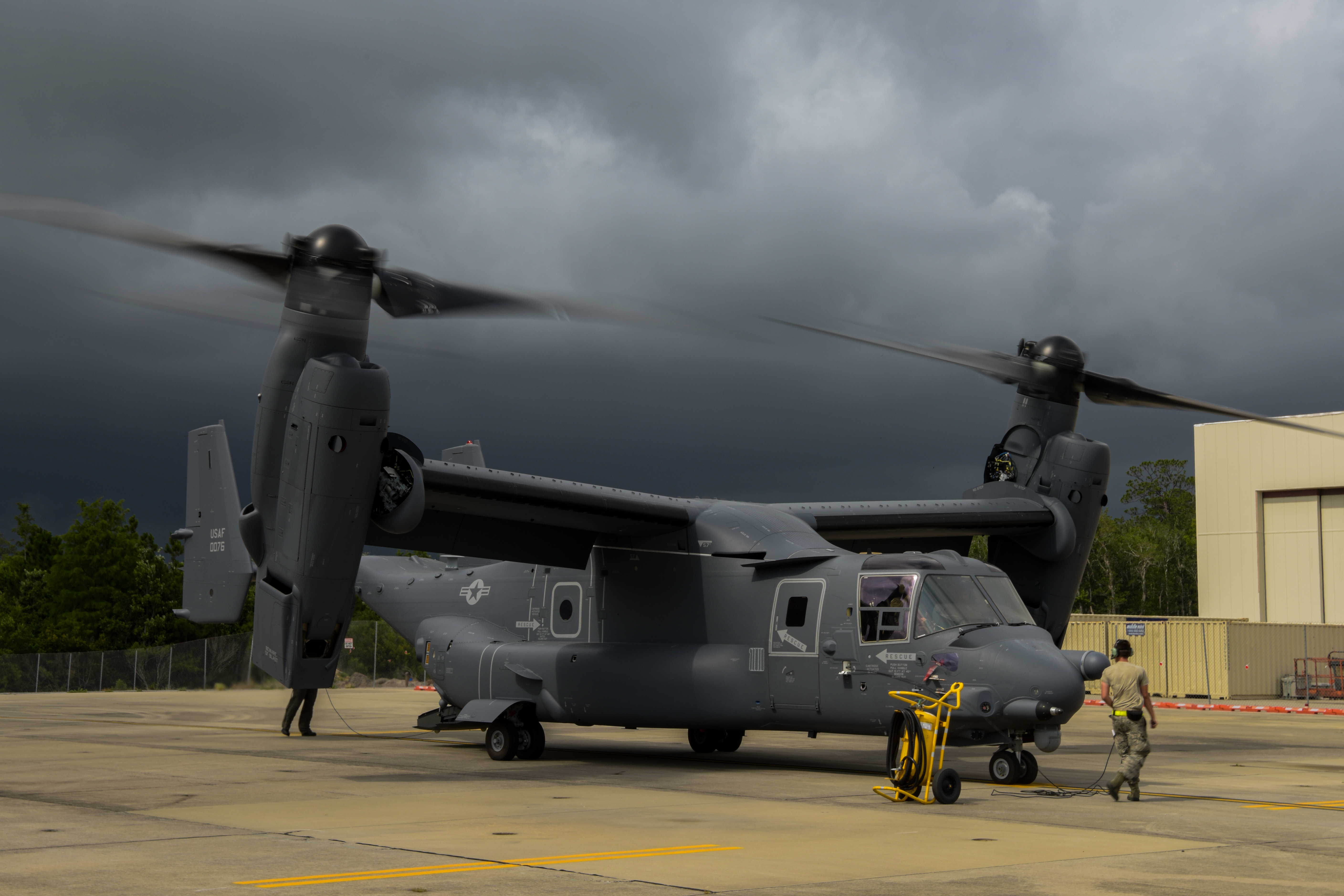 Air Commandos with the 801st Special Operations Aircraft Maintenance Squadron accept delivery of a new CV-22b Osprey tiltrotor aircraft at Hurlburt Field, Florida, Jun. 2, 2020. The 801st SOAMXS helps keep Ospreys ready to execute infiltration, exfiltration, and resupply missions worldwide. (U.S. Air Force photo by Airman 1st Class Nathan LeVang)