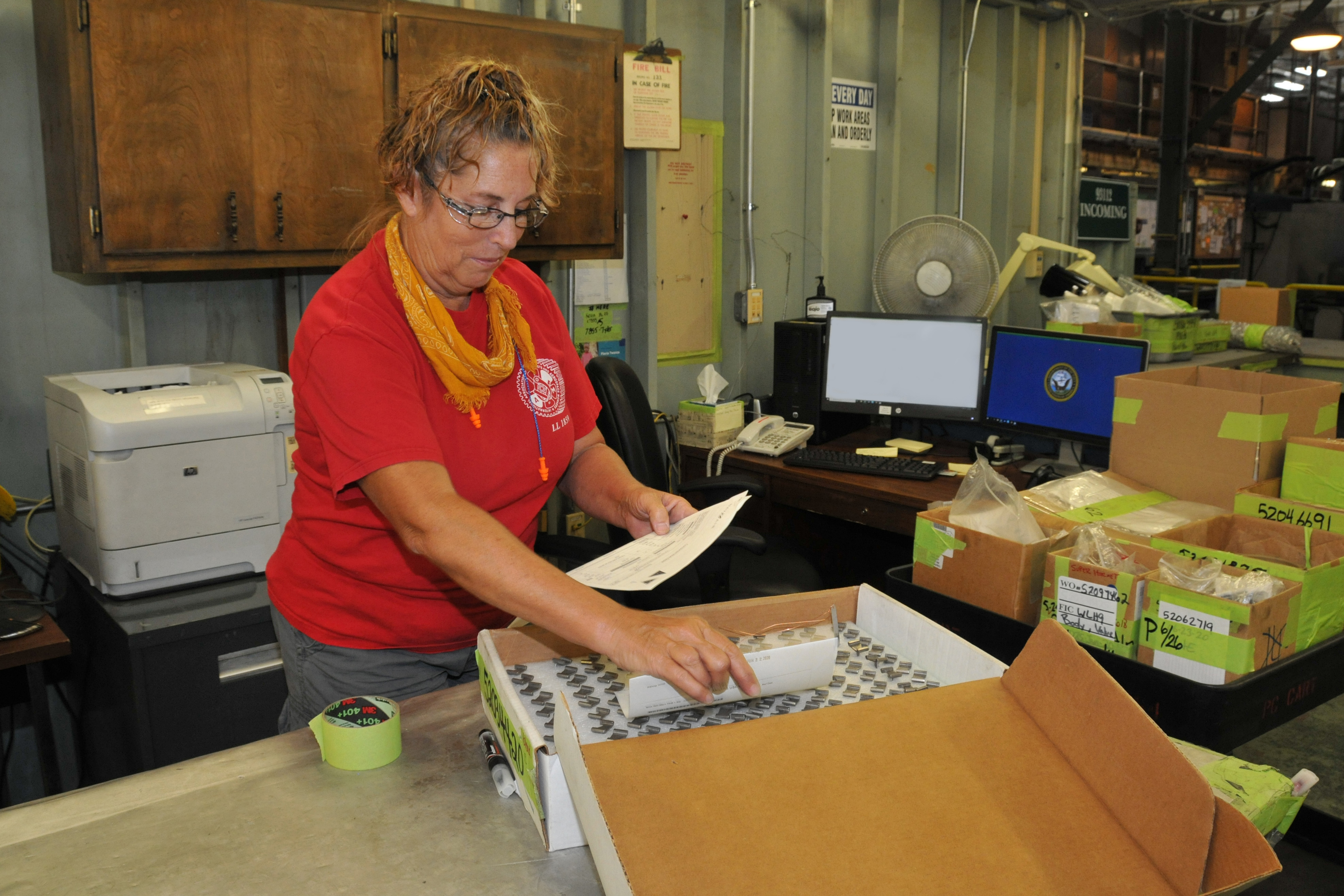 Production controller counts parts before routing them for processing.