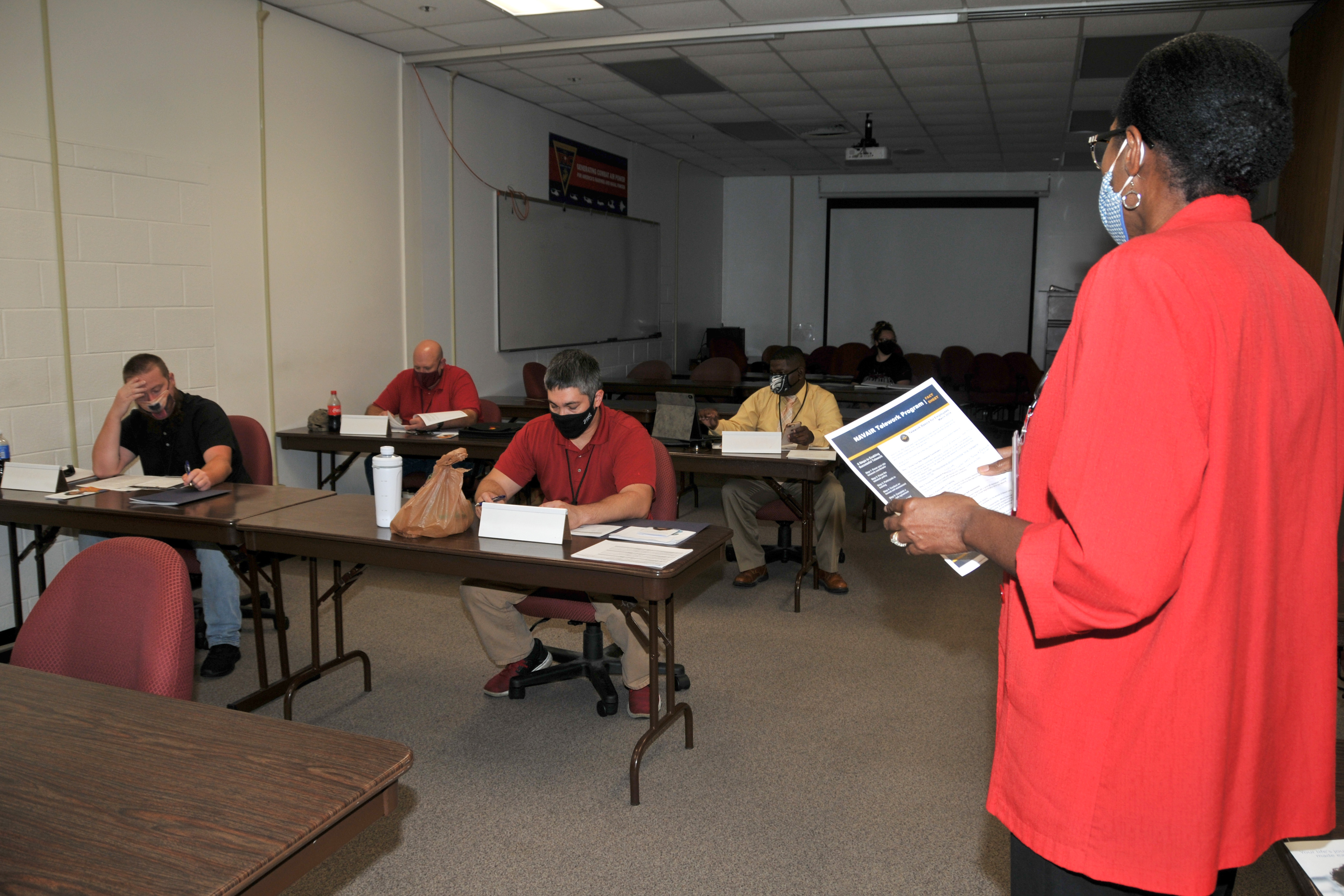 Newly hired apprentices receive training.
