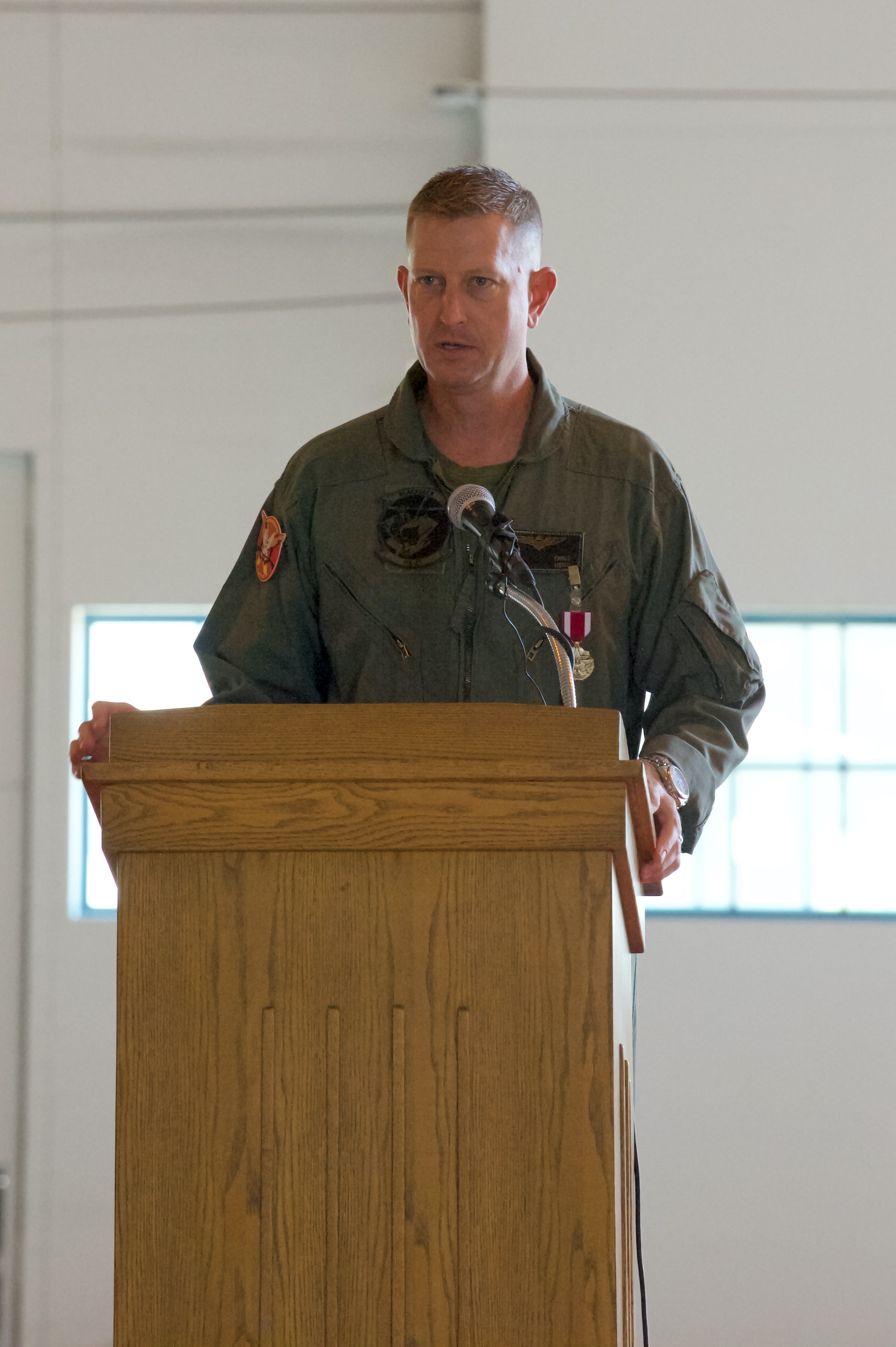 Lt. Col. John Ennis delivers remarks during the change of command ceremony for Air Test and Evaluation Squadron (HX) 21 on Oct. 9, 2020. During the ceremony, Ennis was relieved by CDR Daniel Short, the squadron’s chief test pilot. (U.S. Navy photo by Paul Lagasse)