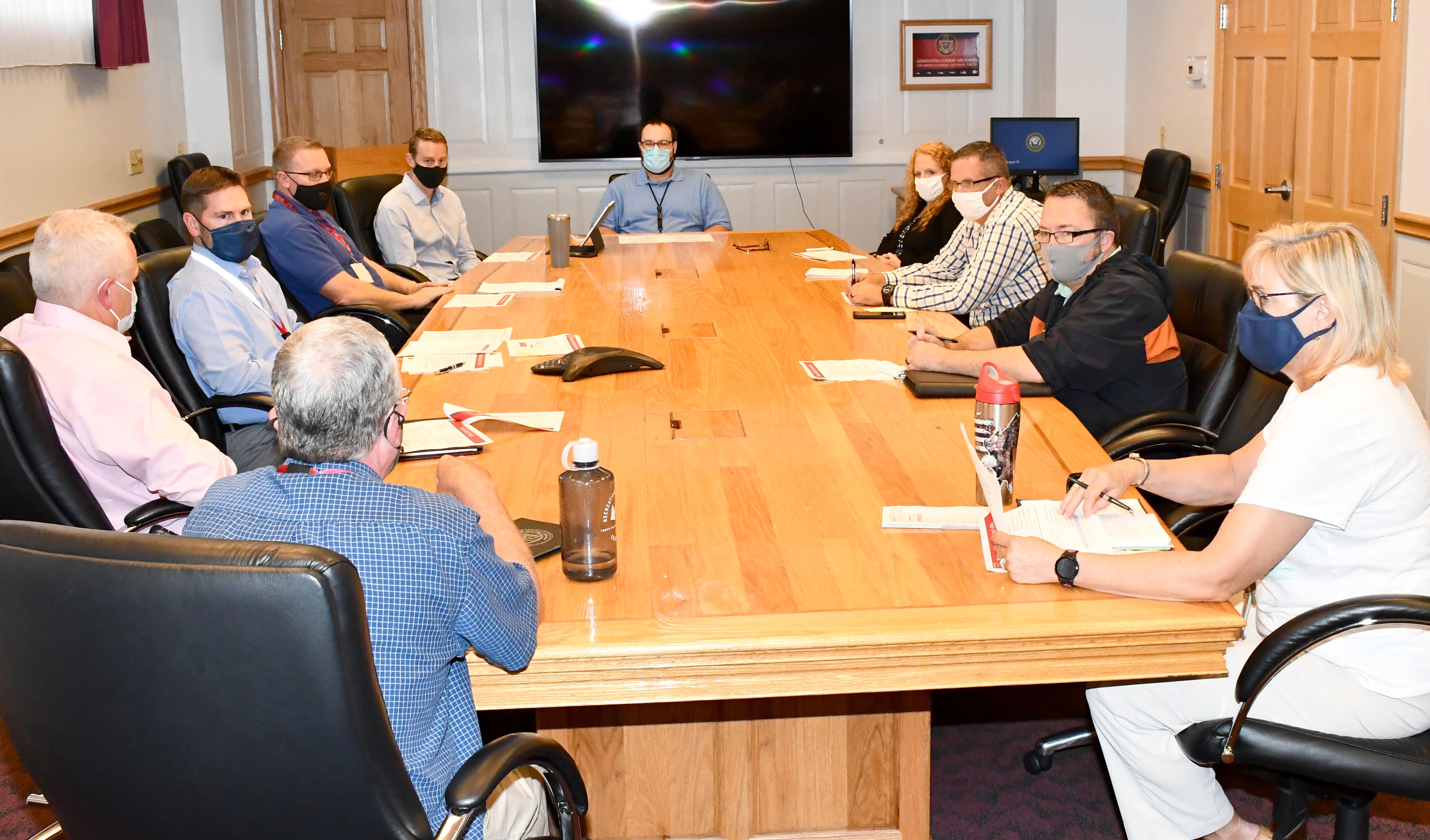 Group of FRCE leaders around table