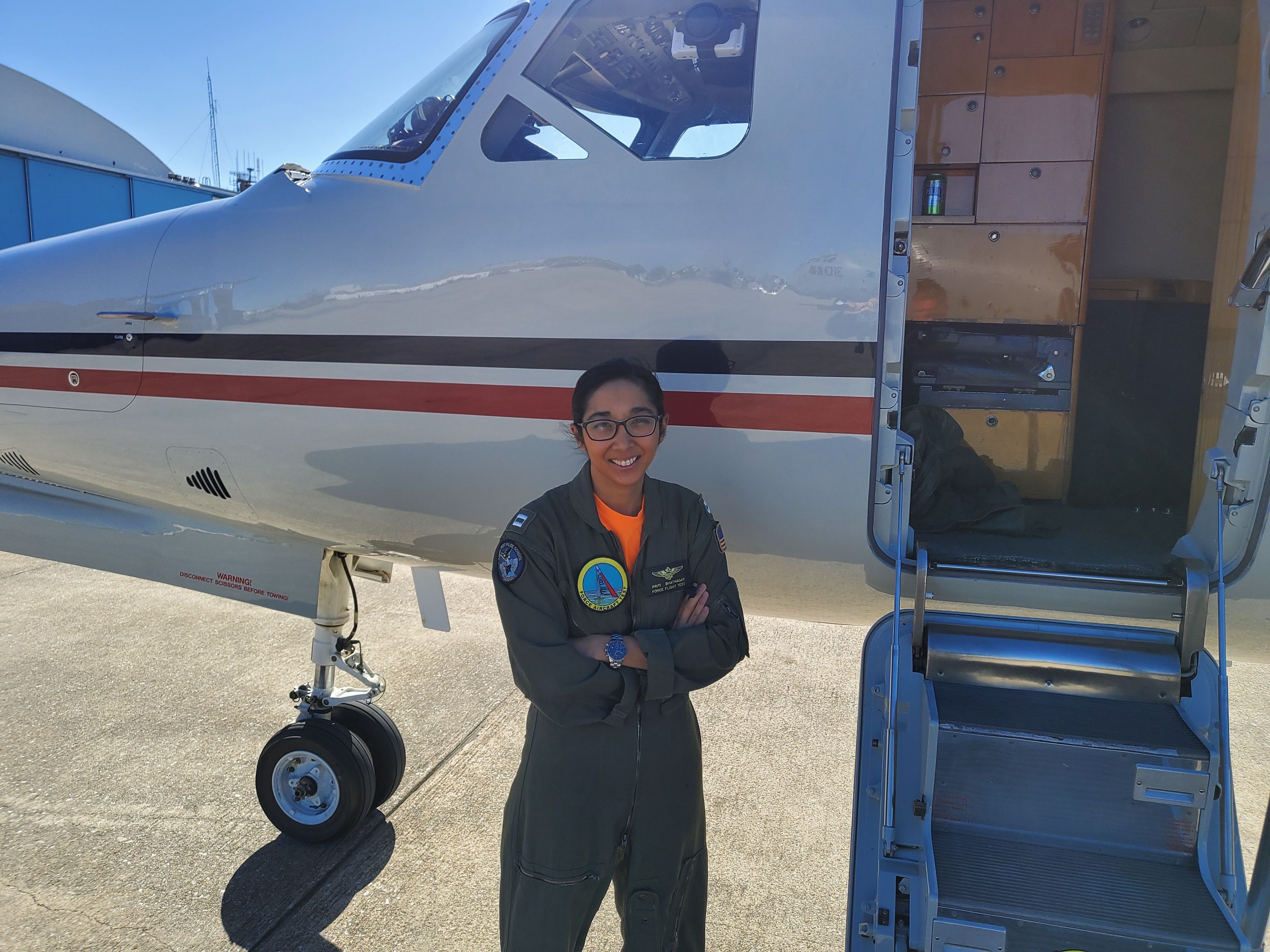 Lt. Priti Bhatnagar, the E-6B Mercury department head and platform coordinator at Air Test and Evaluation Squadron (VX) 20, prepares to board one of the squadron’s C-38A Courier chase and logistics support aircraft prior to a flight. Lt. Bhatnagar is the squadron's 2020 Test Pilot of the Year.