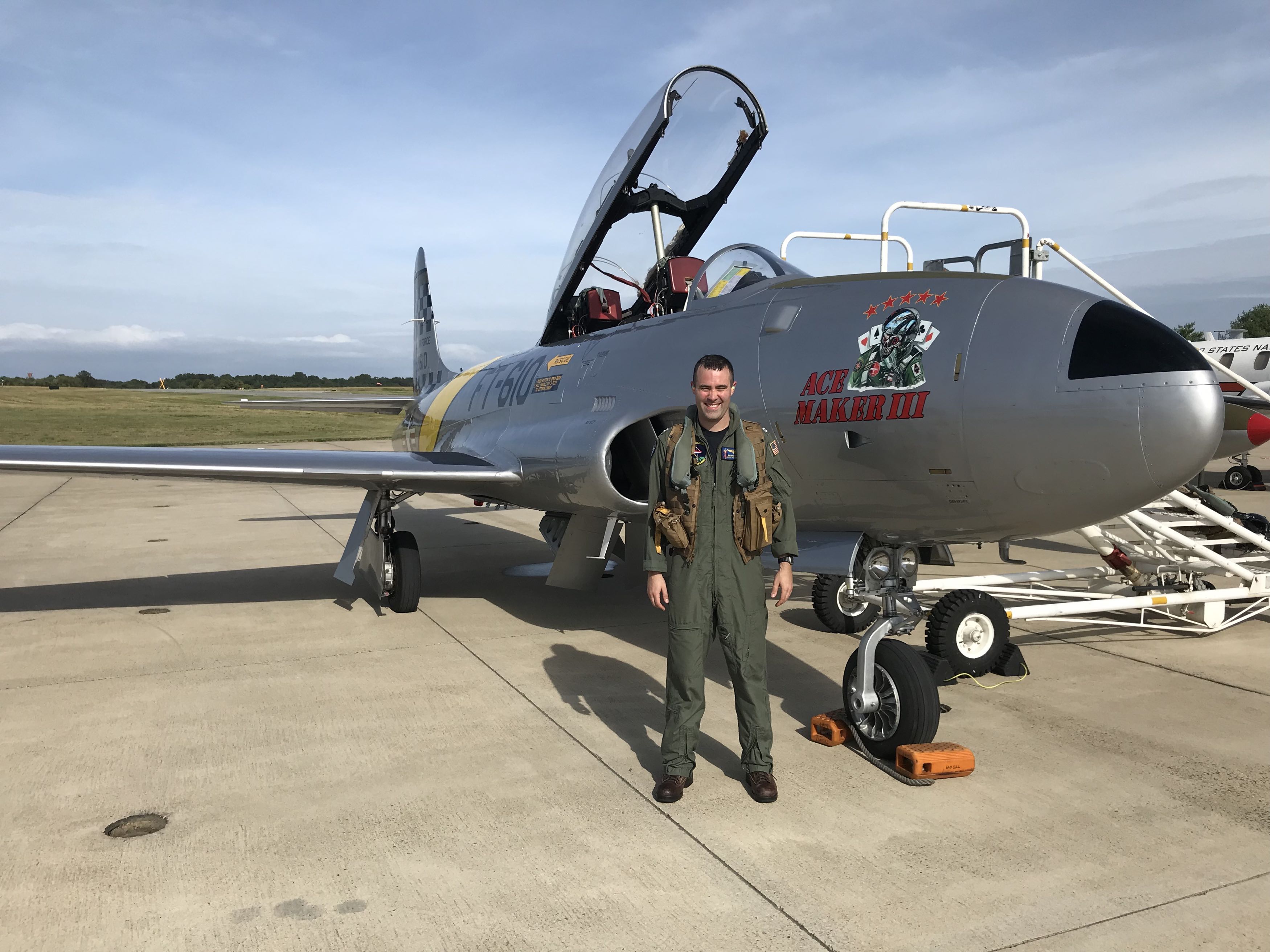 Lt. Mahmood Alaverdi, the E-2D Advanced Hawkeye project officer at Air Test and Evaluation Squadron (VX) 20, poses with “Ace Maker III,” a restored Canadair CT-133 jet trainer from the 1950s, following a qualitative evaluation flight at the U.S. Naval Test Pilot School. Alaverdi is the Airborne Command & Control and Logistics Wing’s 2020 Hawkeye Pilot of the Year (Ashore).