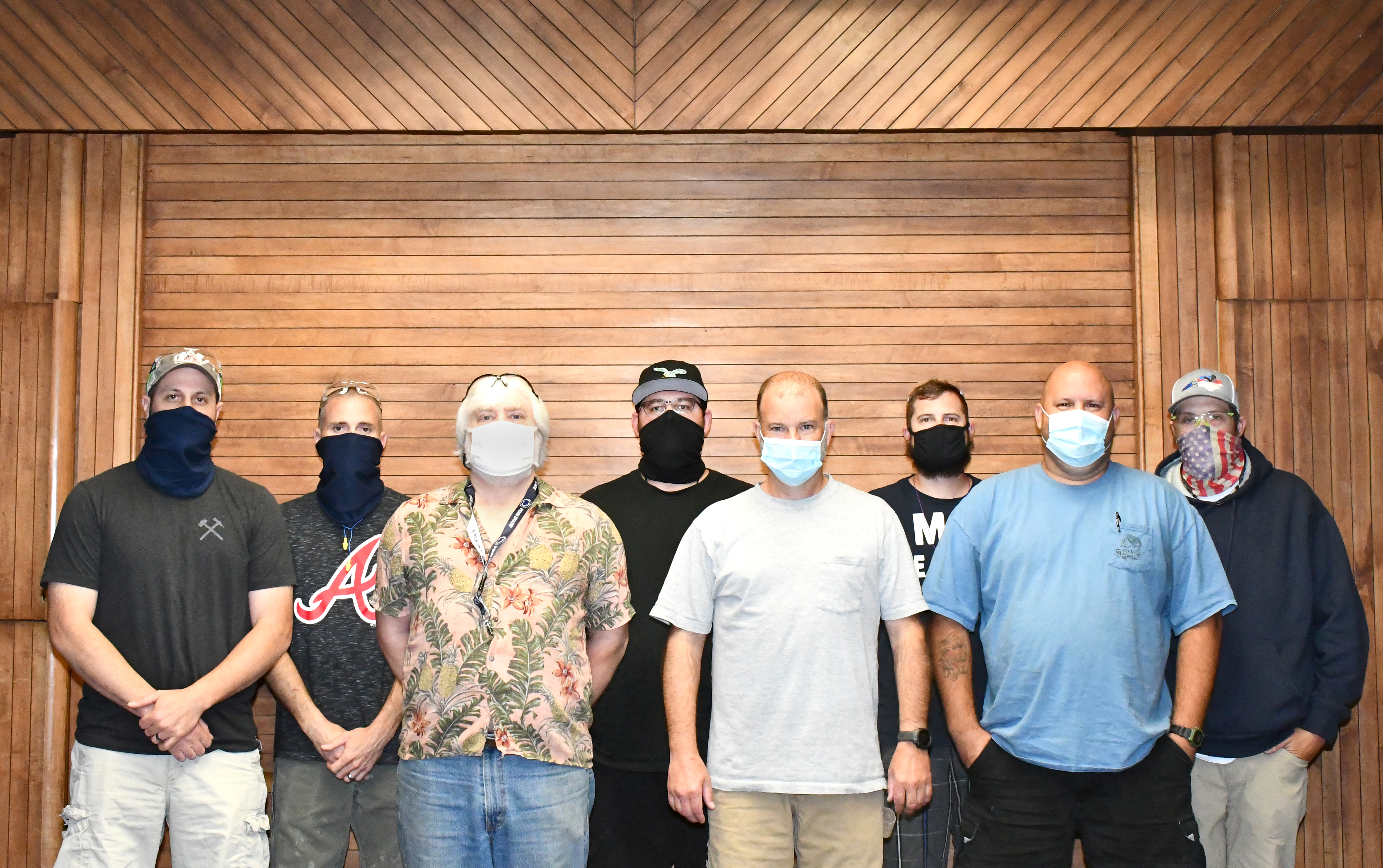 FRCE employees post for a group photo following an award ceremony