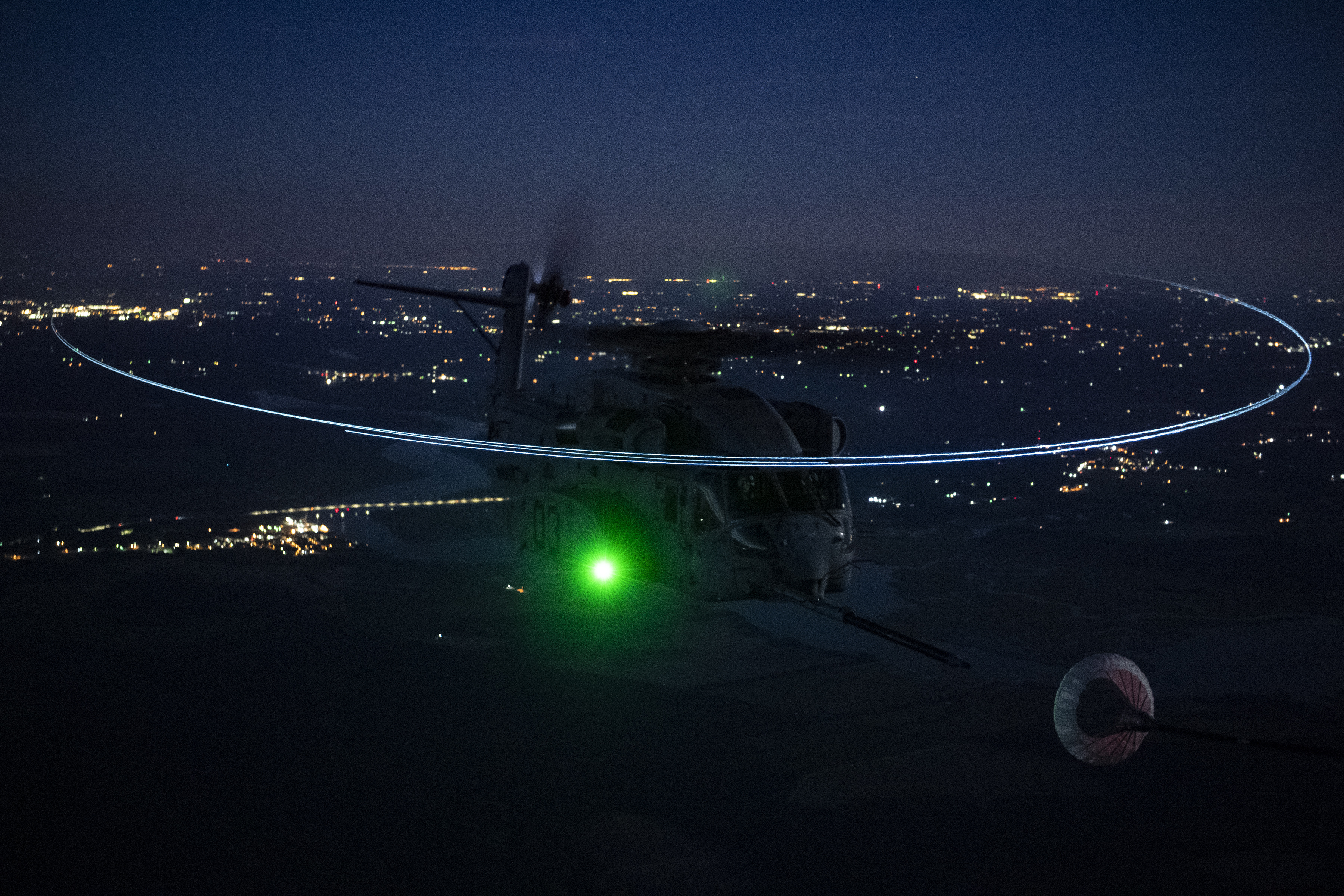CH-53K(TM) executing night vision goggle helicopter aerial refueling
