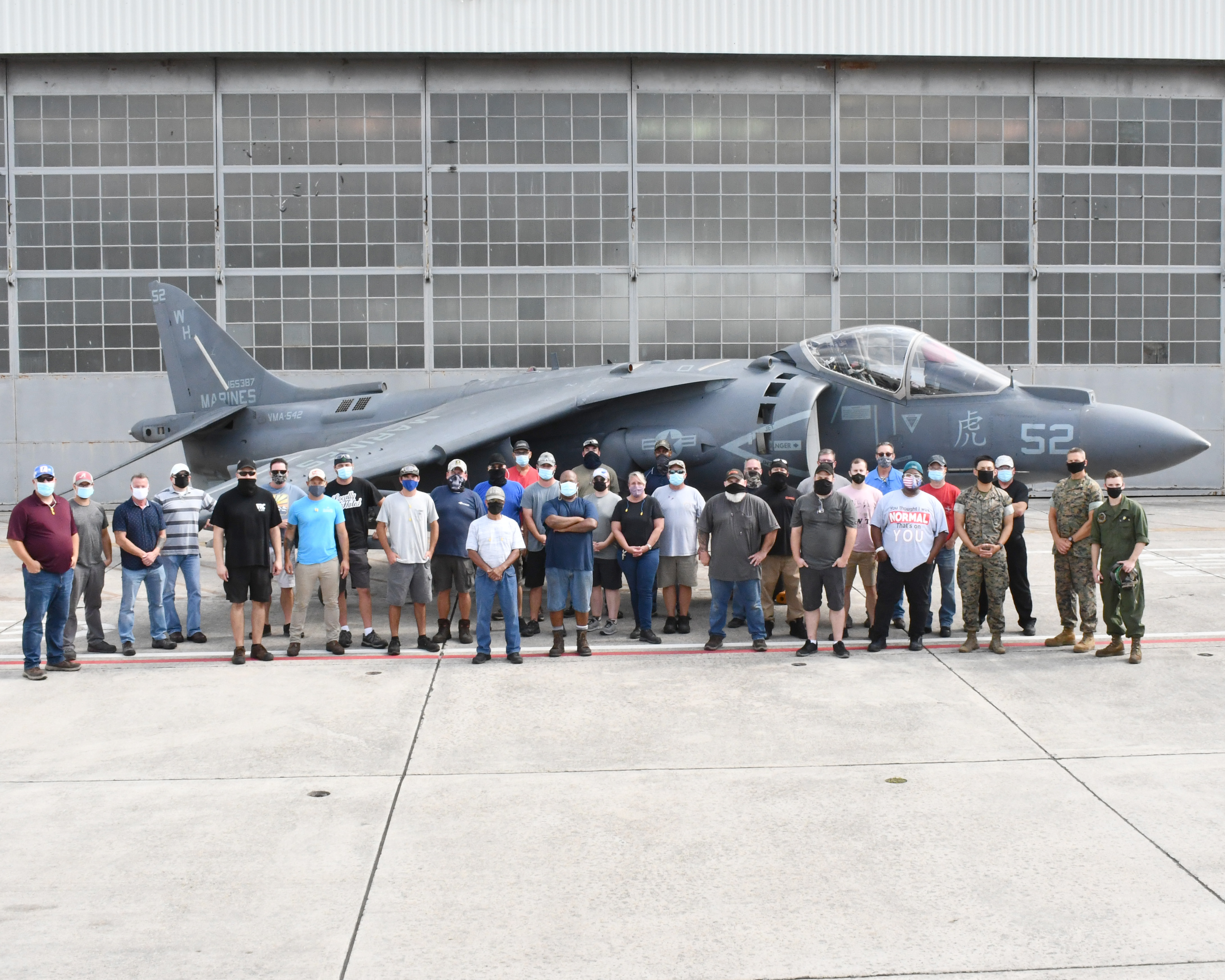 Harrier team in front of aircraft