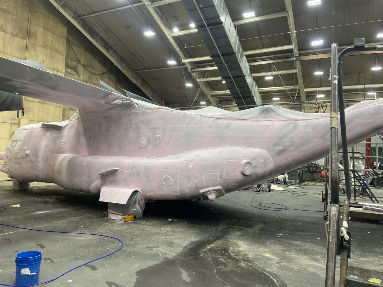 V-22 Osprey being chemically stripped
