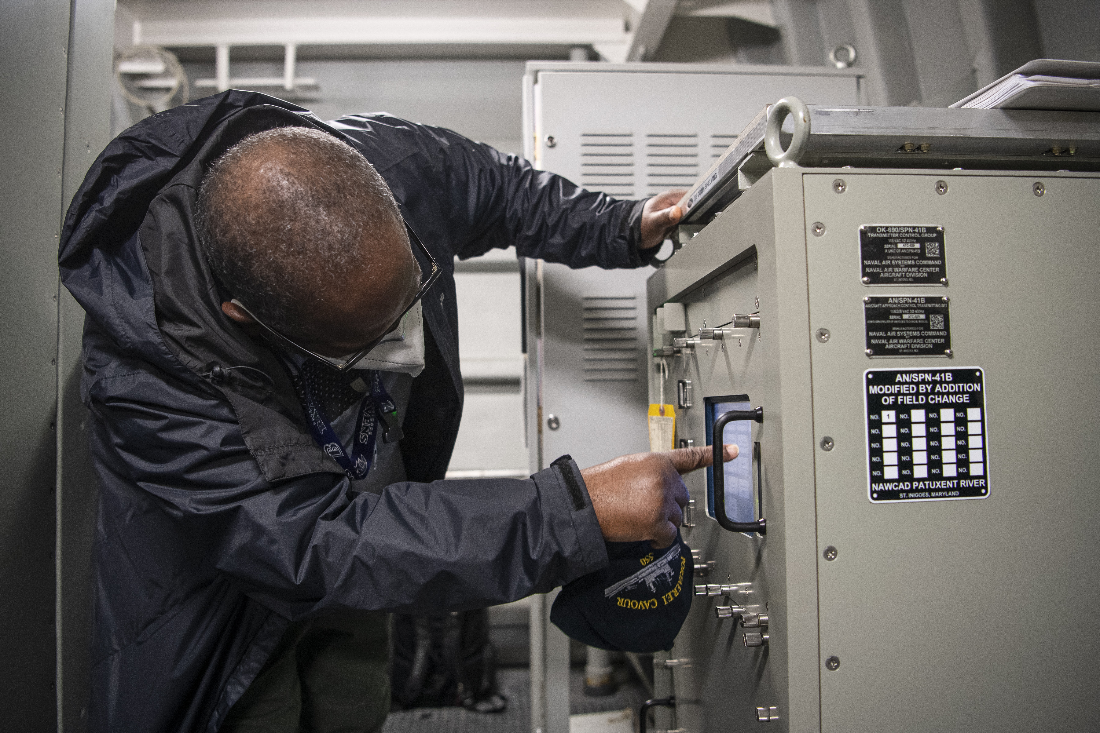 SPN-41B technician V/5 checks the screen on an AN/SPN-41B component/system aboard ITS Cavour 