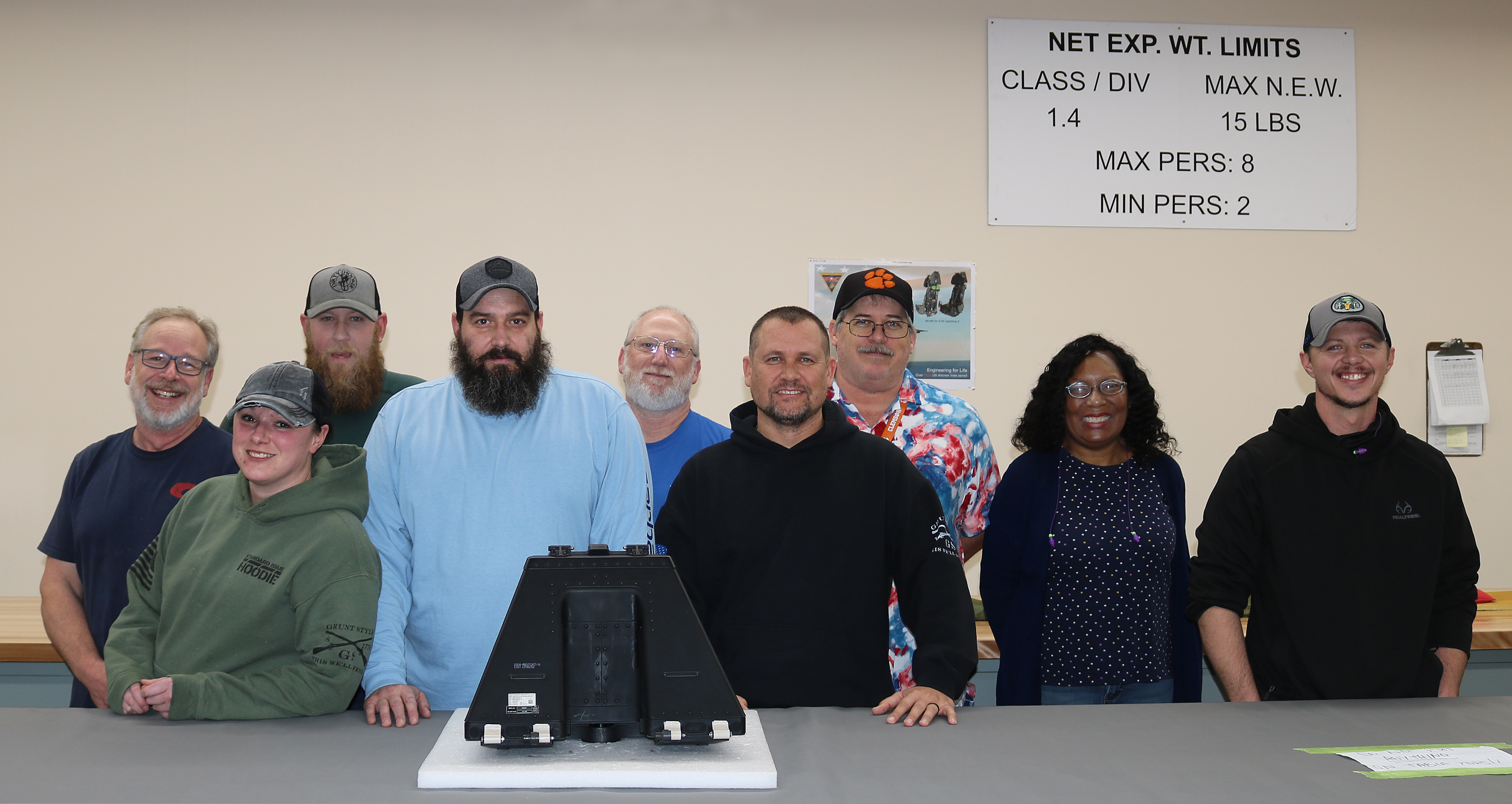 Fleet Readiness Center East’s (FRCE) Ordnance Shop poses for a photo with the 100th F-35 Lightning II parachute repacked at the depot. FRCE achieved this milestone less than one year after inducting their first F-35 parachute. Since 2018, the depot had declared capability on 32 components, including the parachutes for the fifth-generation fighter. 