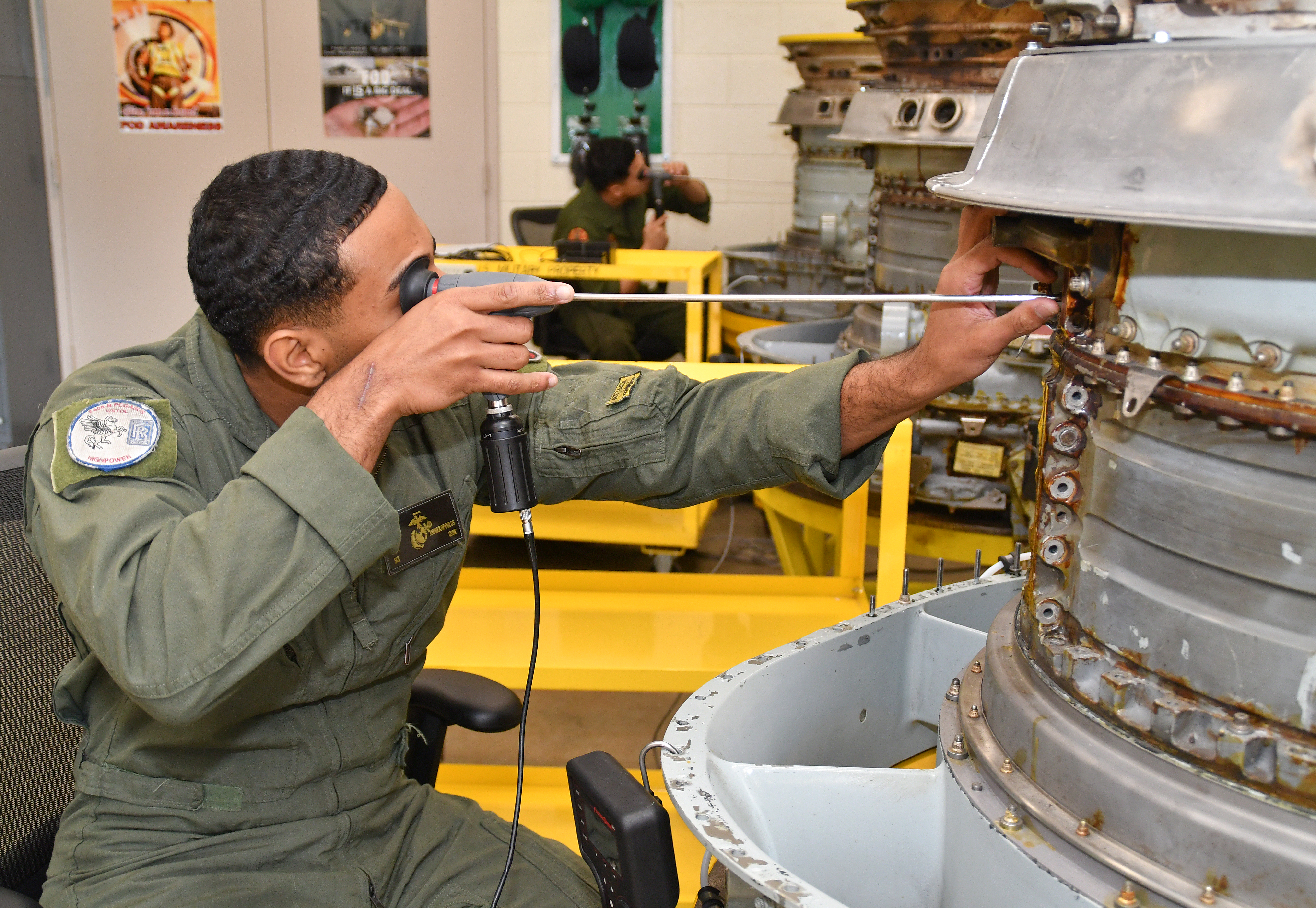 U.S. Marine Corps Sgt. Eric Andrekopoulos, assigned to Marine Attack Squadron (VMA) 223, participates in a practical exercise as part of the F402 Engine Tier 5 Remote Visual Inspection (RVI) Inspector Rating certification course at Fleet Readiness Center East, Mar. 6, 2023.