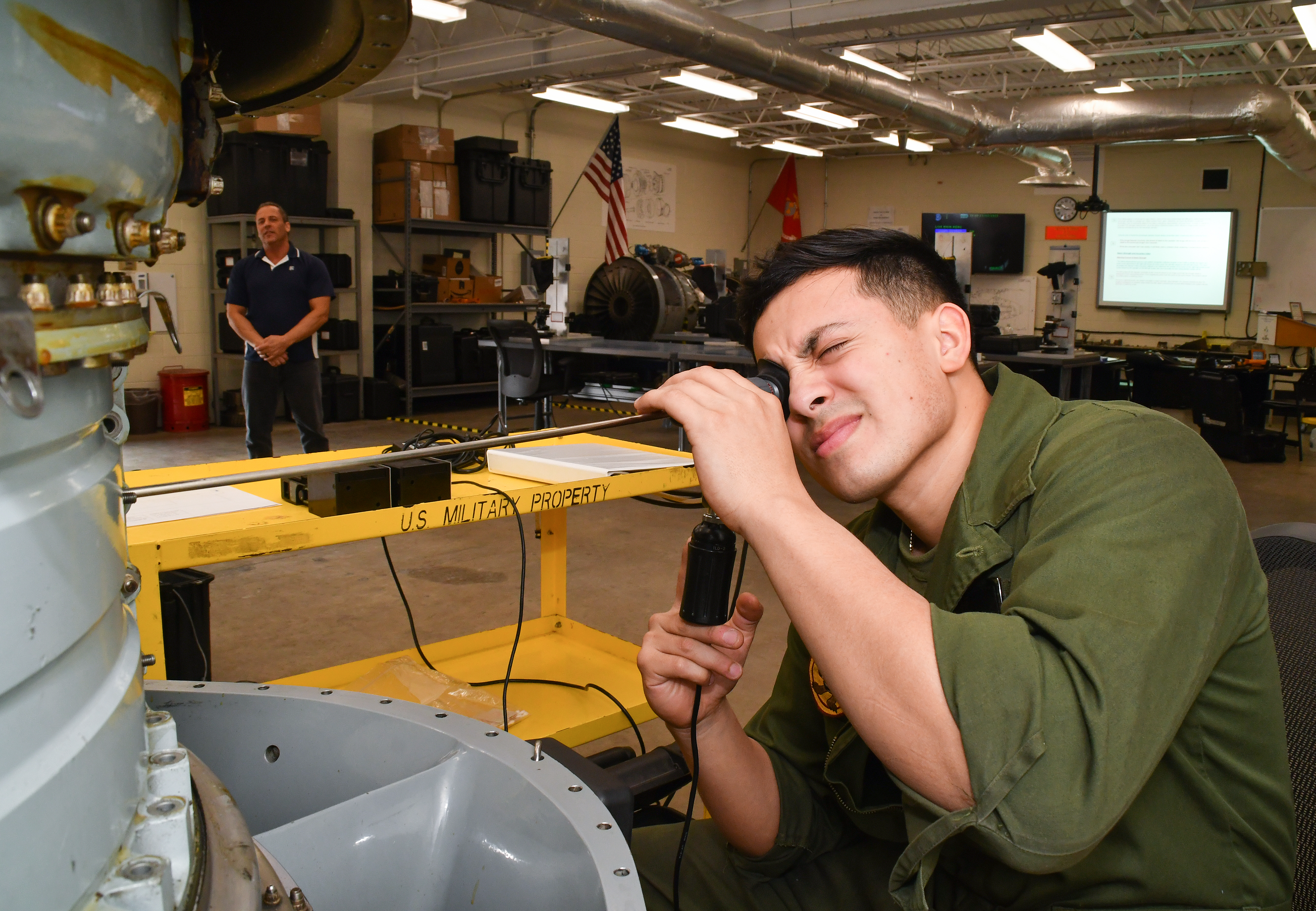 U.S. Marine Corps Lance Cpl. Jesus Hernandez, assigned to Marine Attack Squadron (VMA) 223, participates in a practical exercise as part of the F402 Engine Tier 5 Tier 5 Remote Visual Inspection (RVI) Inspector Rating certification course at Fleet Readiness Center East, Mar. 6, 2023.