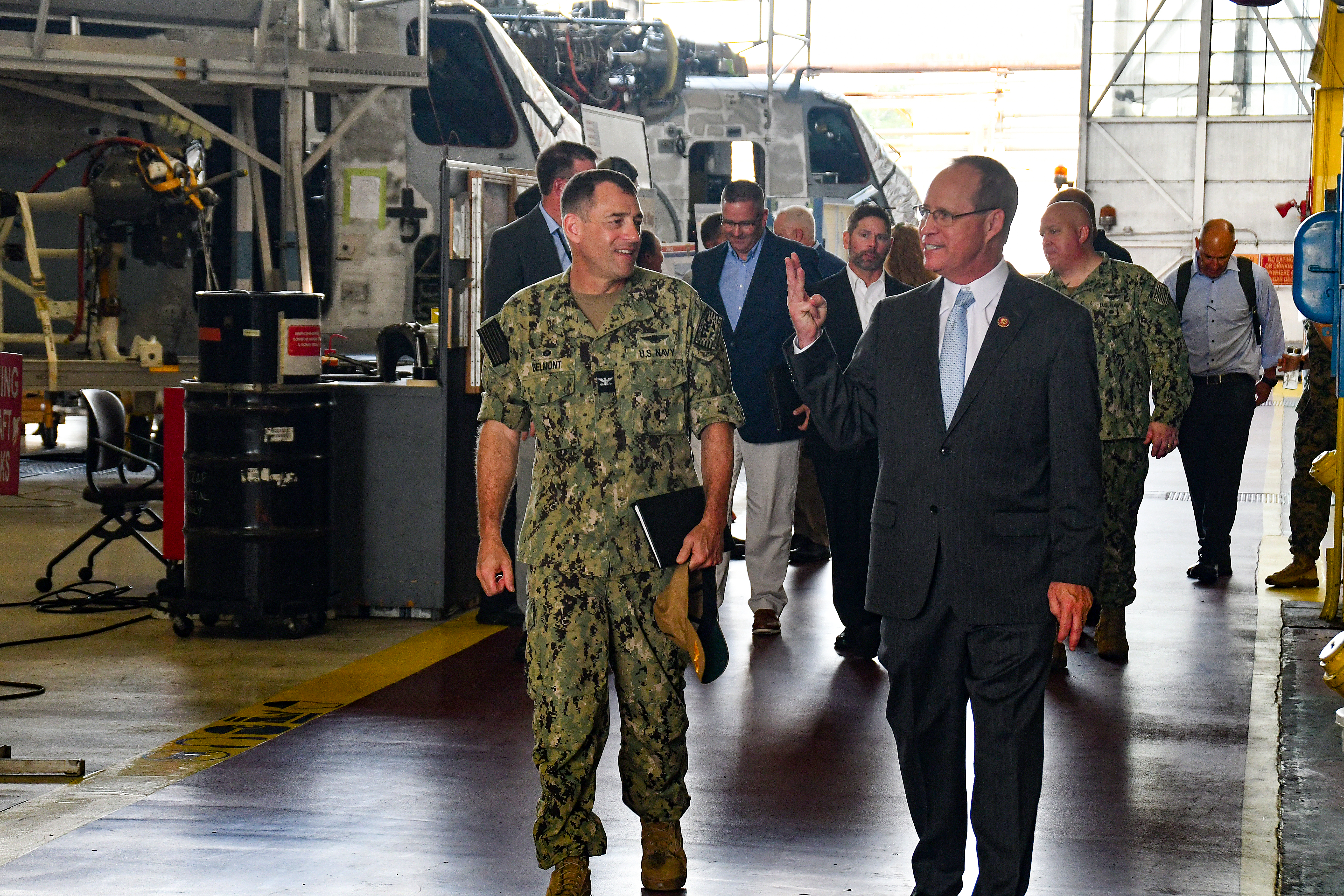 Fleet Readiness Center East (FRCE) Commanding Officer Capt. James M. Belmont, left, briefs U.S. Rep. Greg Murphy on the depot’s H-53 heavy-lift helicopter line during Murphy’s visit to the facility Aug. 14. FRCE hosted Murphy, who represents North Carolina’s 3rd Congressional District in the U.S. House of Representatives, for briefings and a tour focused on the depot’s expanding workload and future capabilities, including enhanced support of the fifth-generation F-35 Lightning II aircraft. 