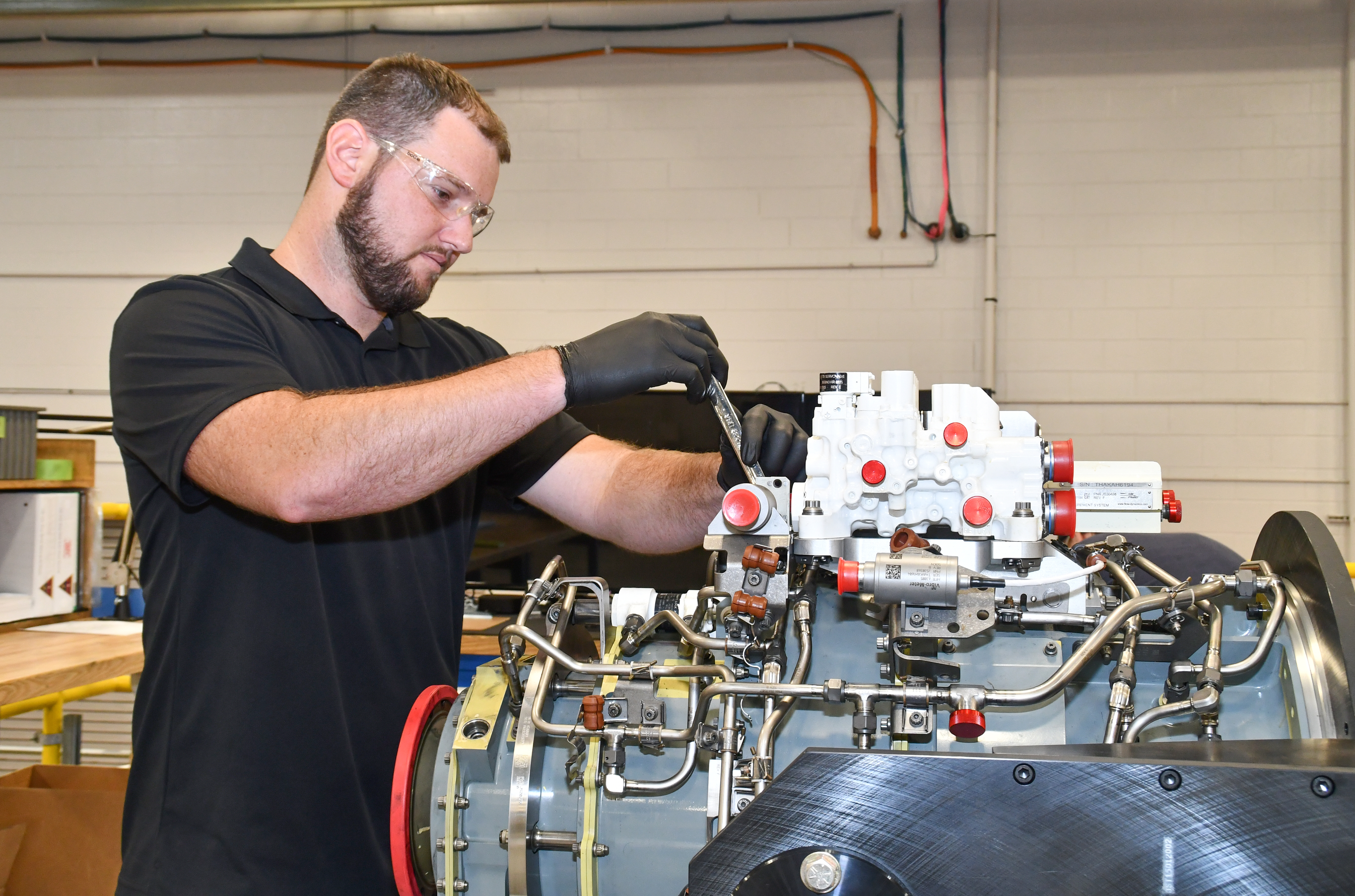 Steven Murray, an aircraft engine mechanic at Fleet Readiness Center East (FRCE), begins disassembly of a lift fan clutch for the F-35B Lightning II aircraft. FRCE personnel became the first within the Department of Defense (DoD) to perform a successful assembly of this component outside of Rolls Royce’s LiftWorks facility in Indianapolis. 