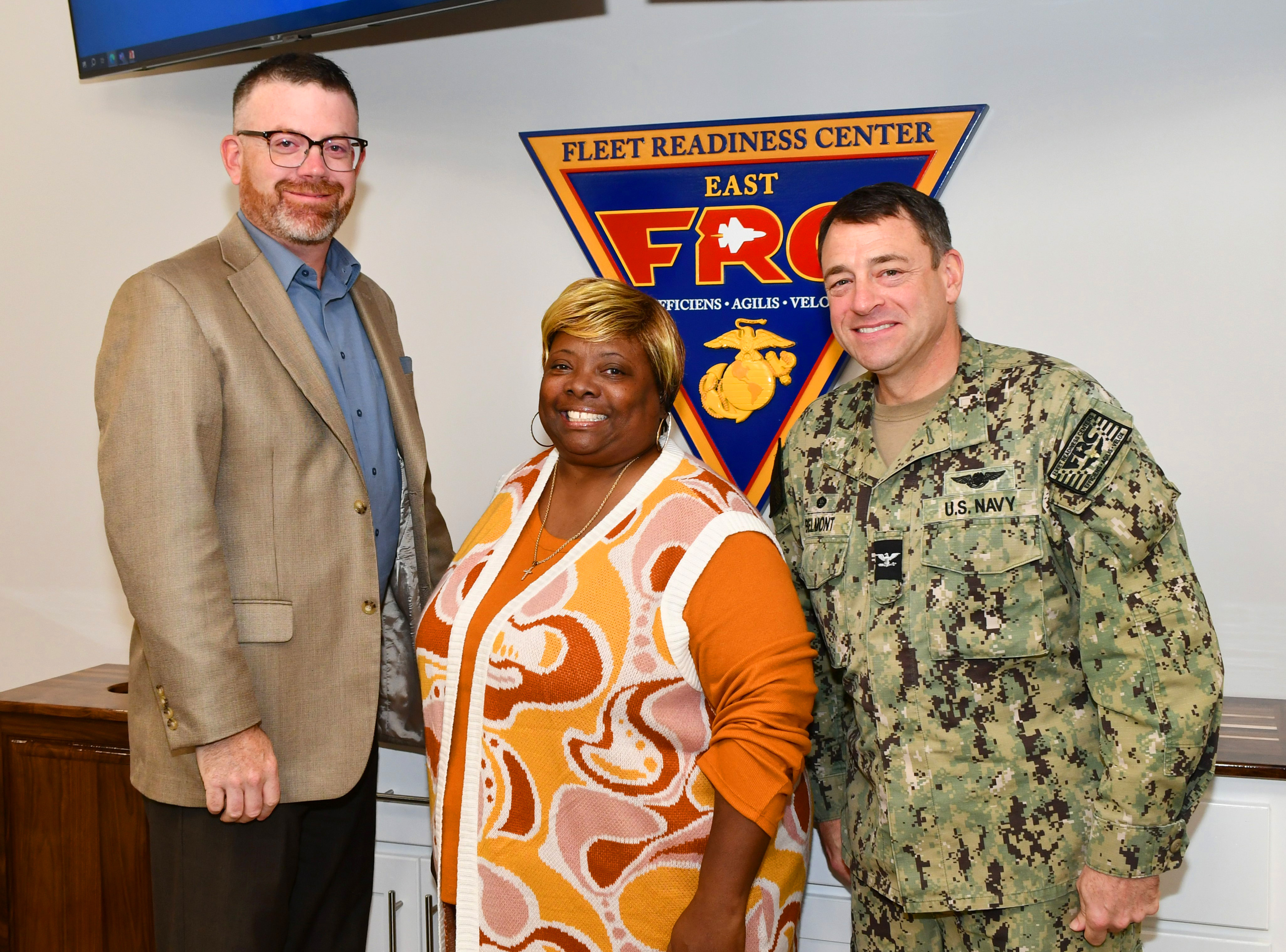 Group photo of FRCE supervisor of the year and command leaders posing for camera 