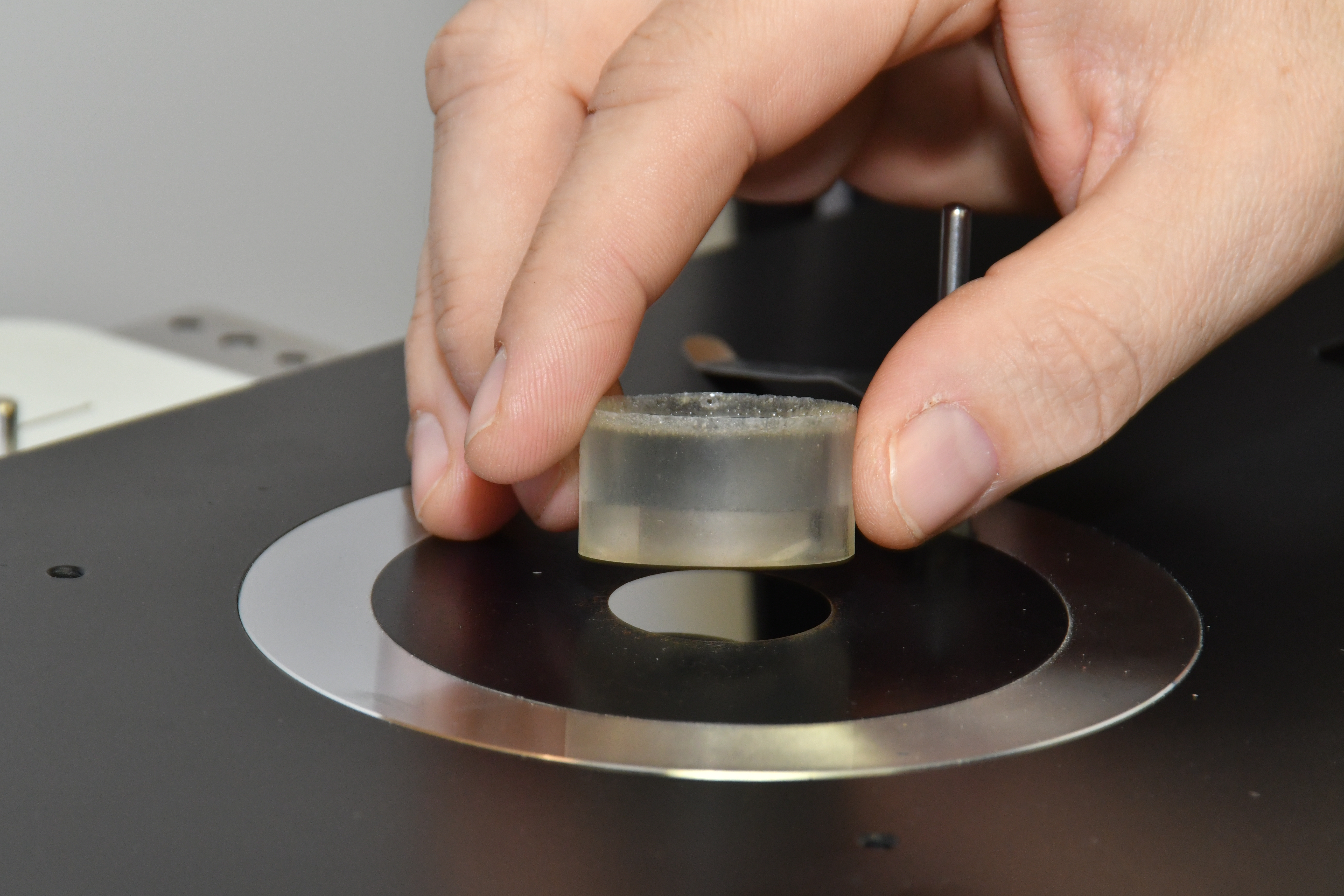 A sample of metal is placed into a metallograph to analyze the micro structure of a piece of metal at high magnification inside the laboratory at Fleet Readiness Center East’s (FRCE) Materials Engineering Division. The Materials Engineering Division utilizes state of the art laboratory equipment to perform research, testing and evaluation activities as well as to develop and continually improve the processes in use within FRCE. 