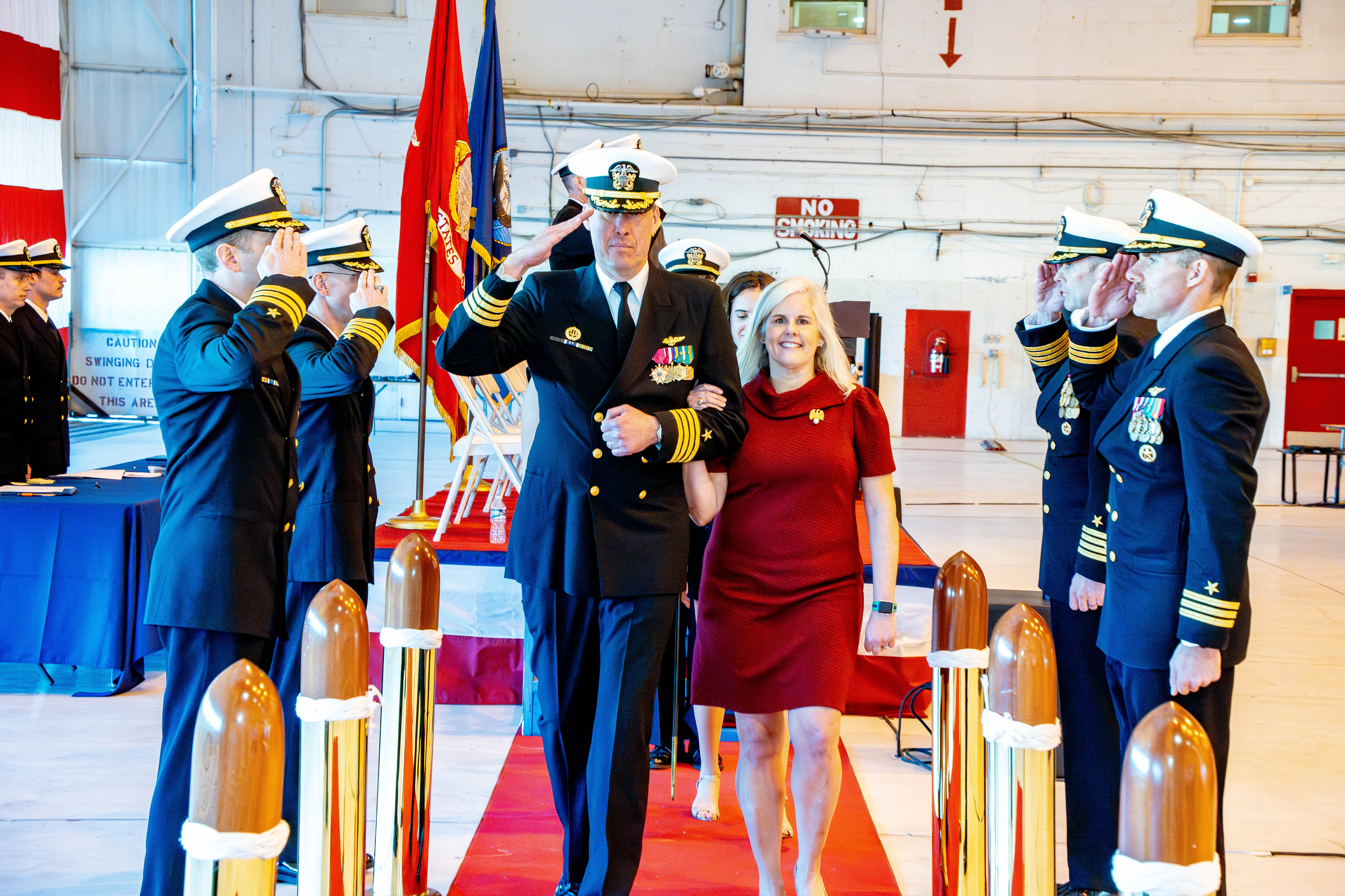 A sailor walking with his wife