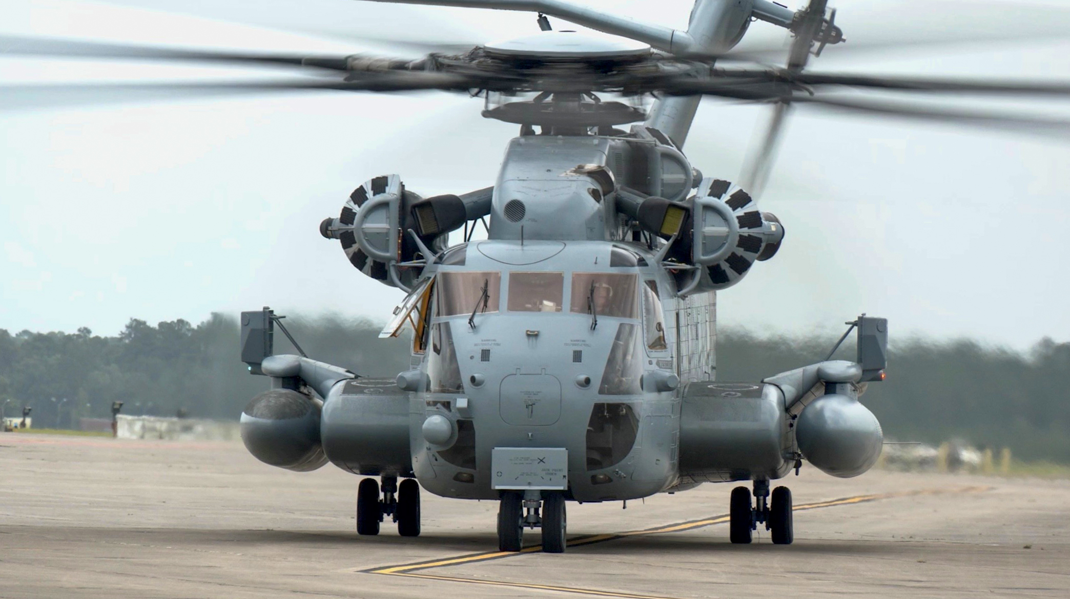 CH-53E helicopter taxing on runway