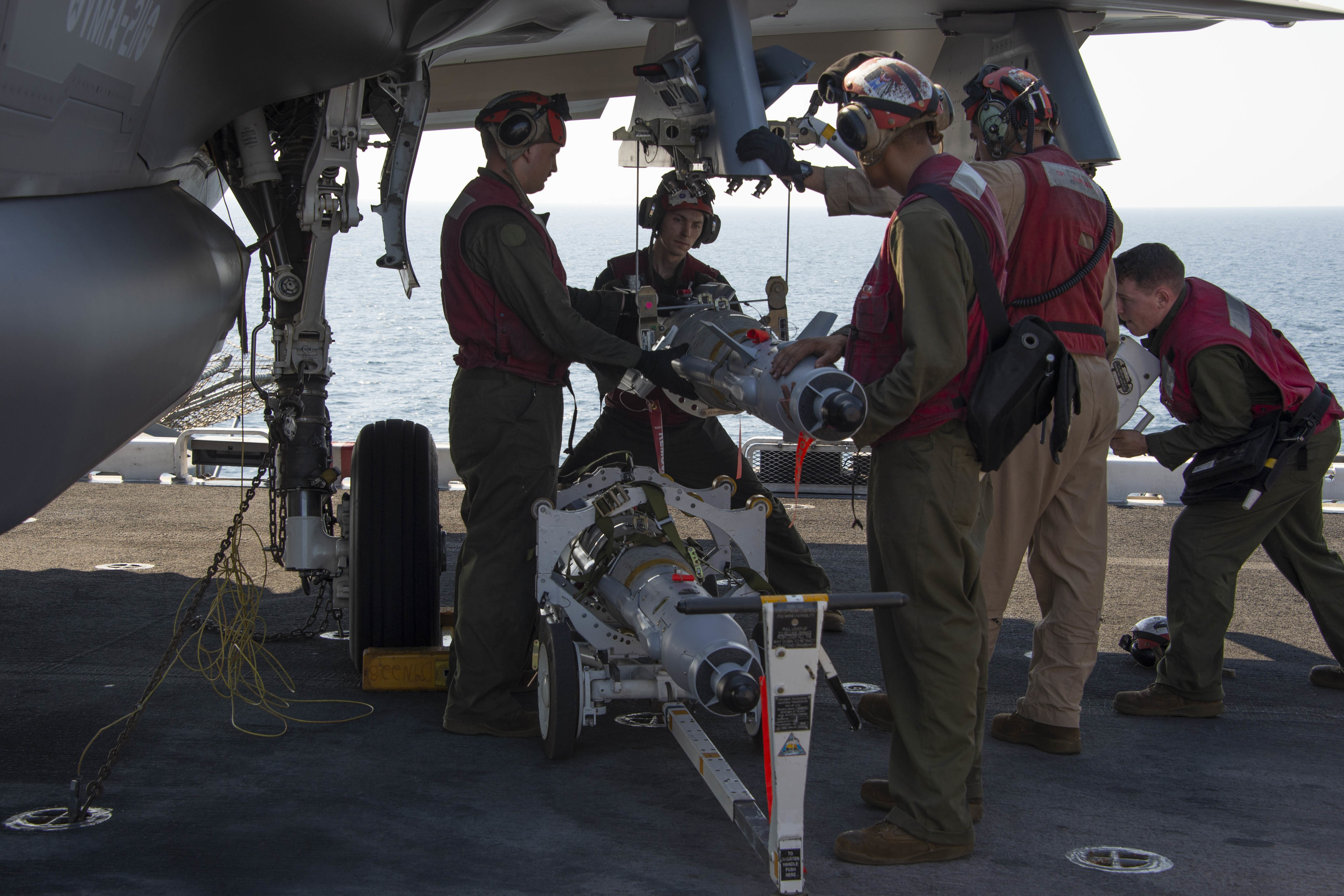 Guided Bomb Unit-49 being loaded onto F-35B Lightning II