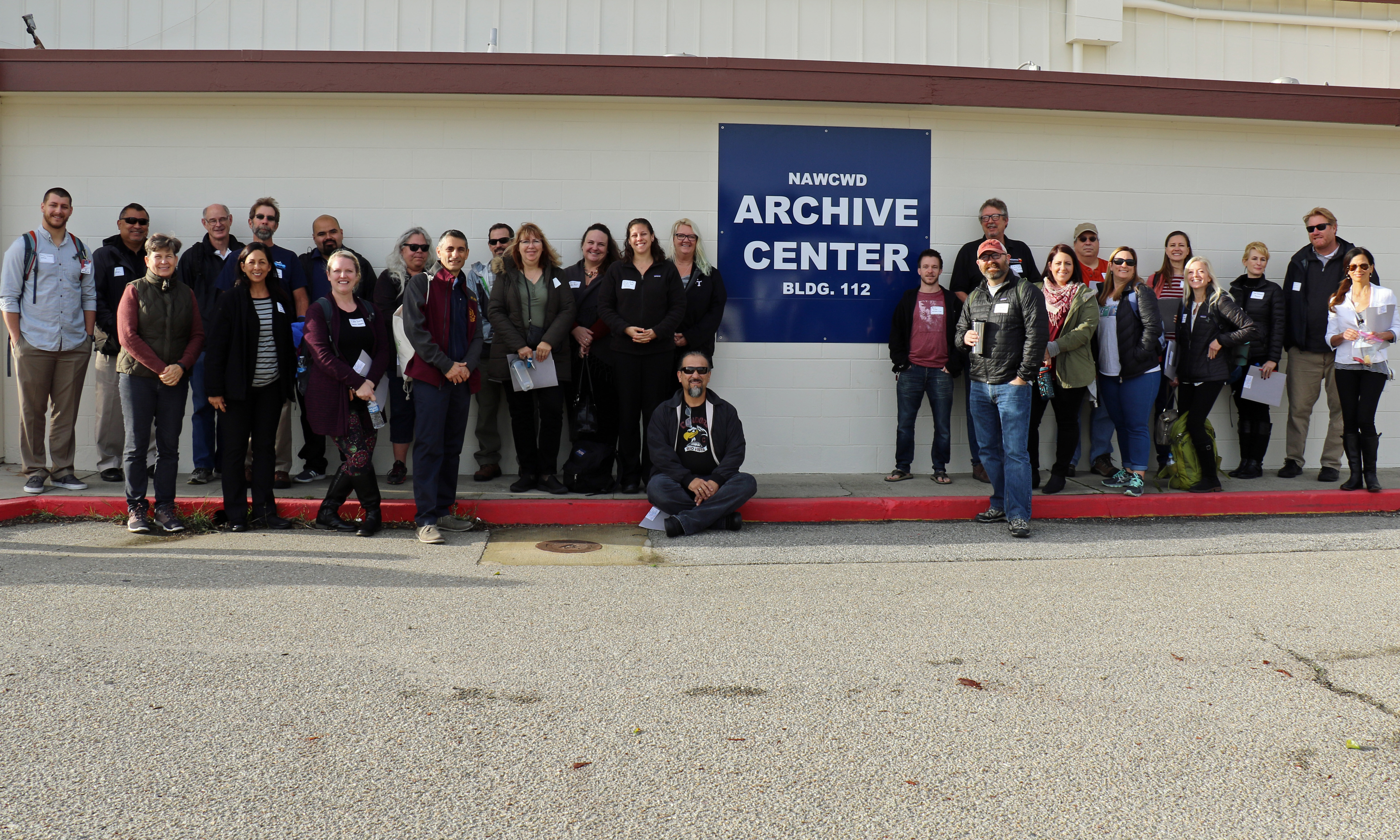Teachers pose in front of NAWCWD Archive Center in Point Mugu, California