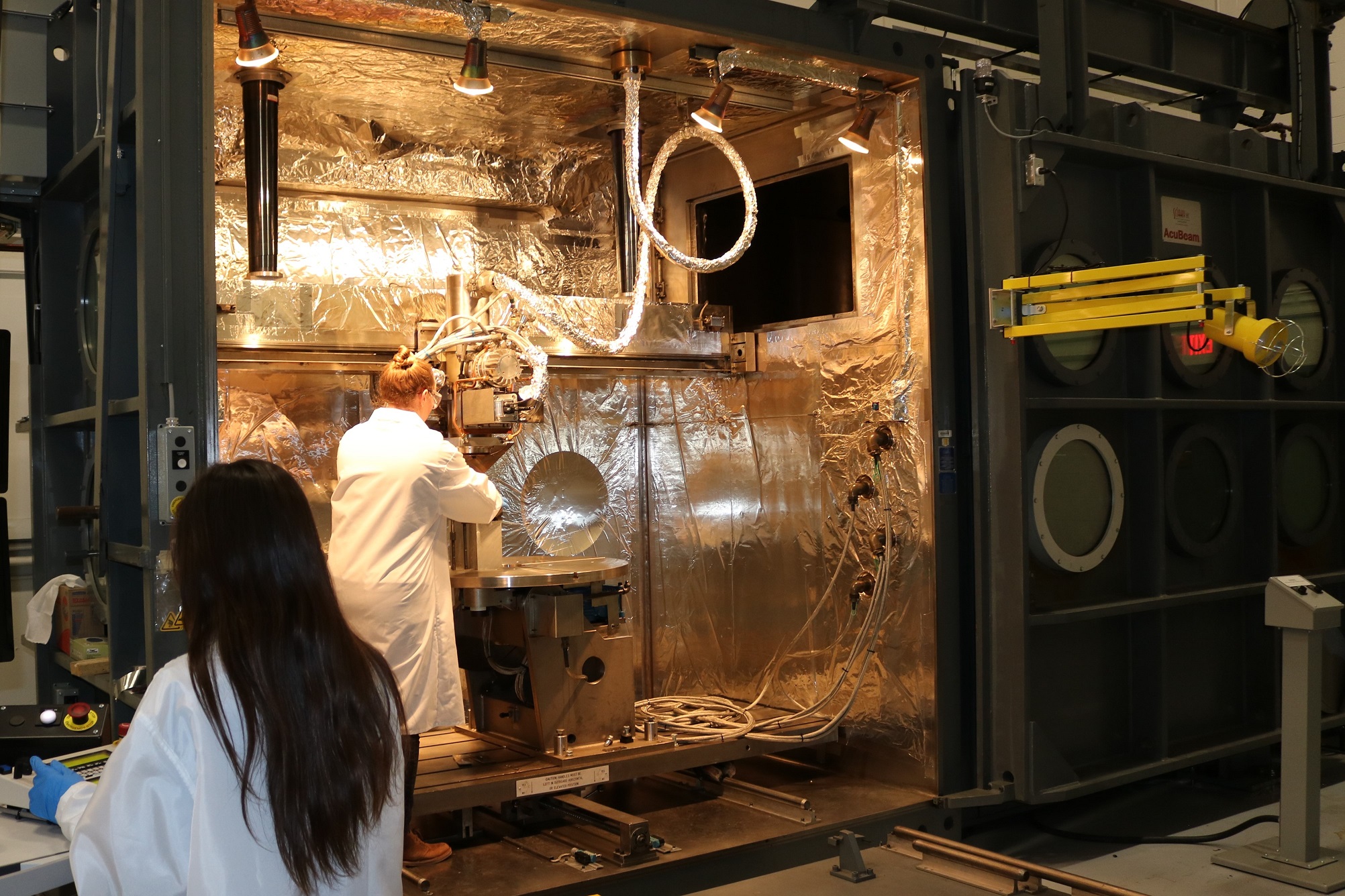 Engineers fixture a part using additive manufacturing