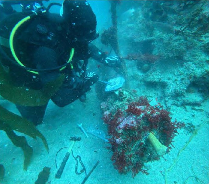 U.S. Navy Seabee Divers from Underwater Construction Team (UCT) 2’s Construction Dive Detachment (CDD) Charlie 80 feet under water