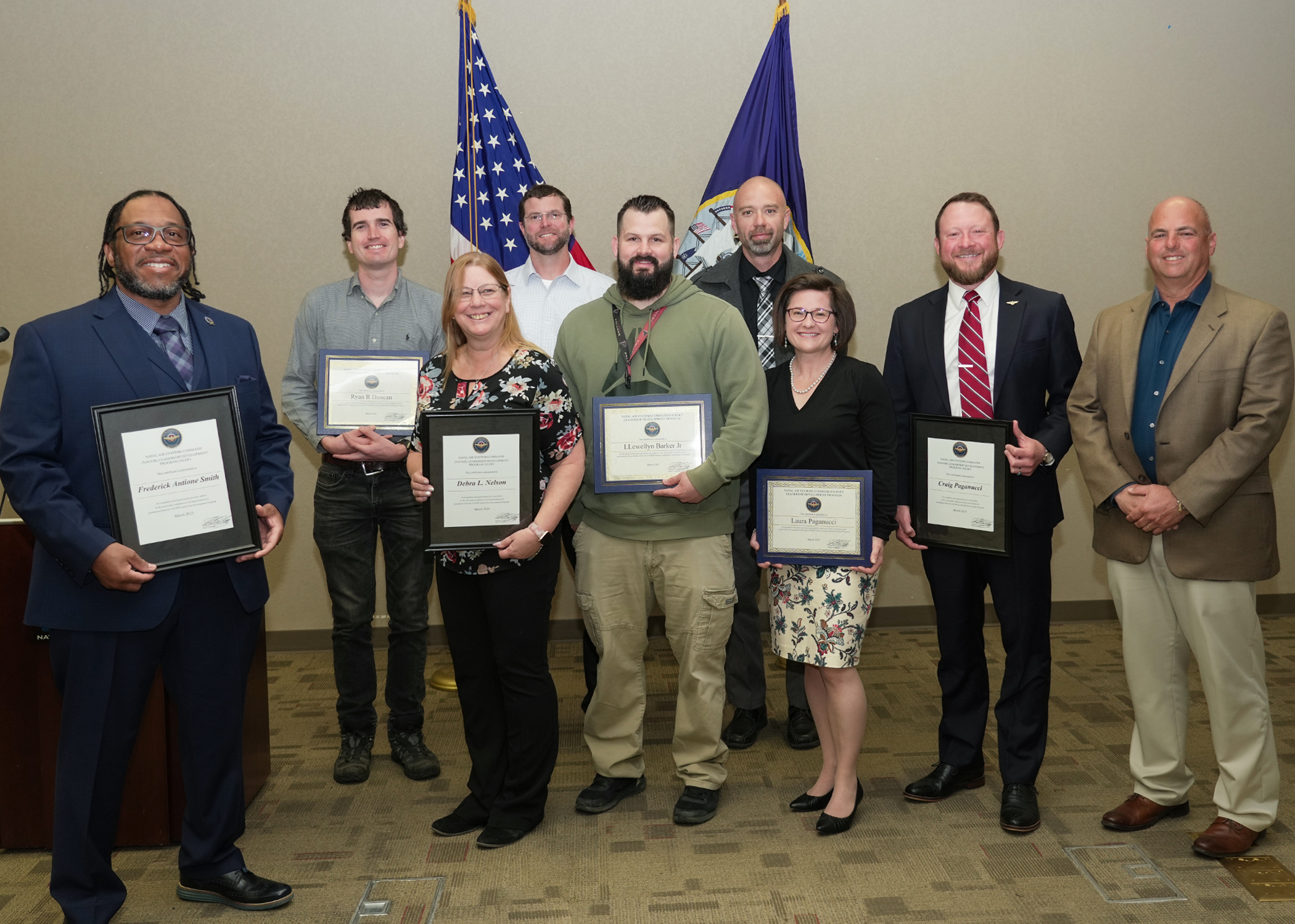 NAWCWD graduates for NLDP and JLDP who attended graduation at China Lake pose with Dan Carreño, NAWCWD executive director, far right, on March 29. (U.S. Navy Photo by Ron Rodriguez) 