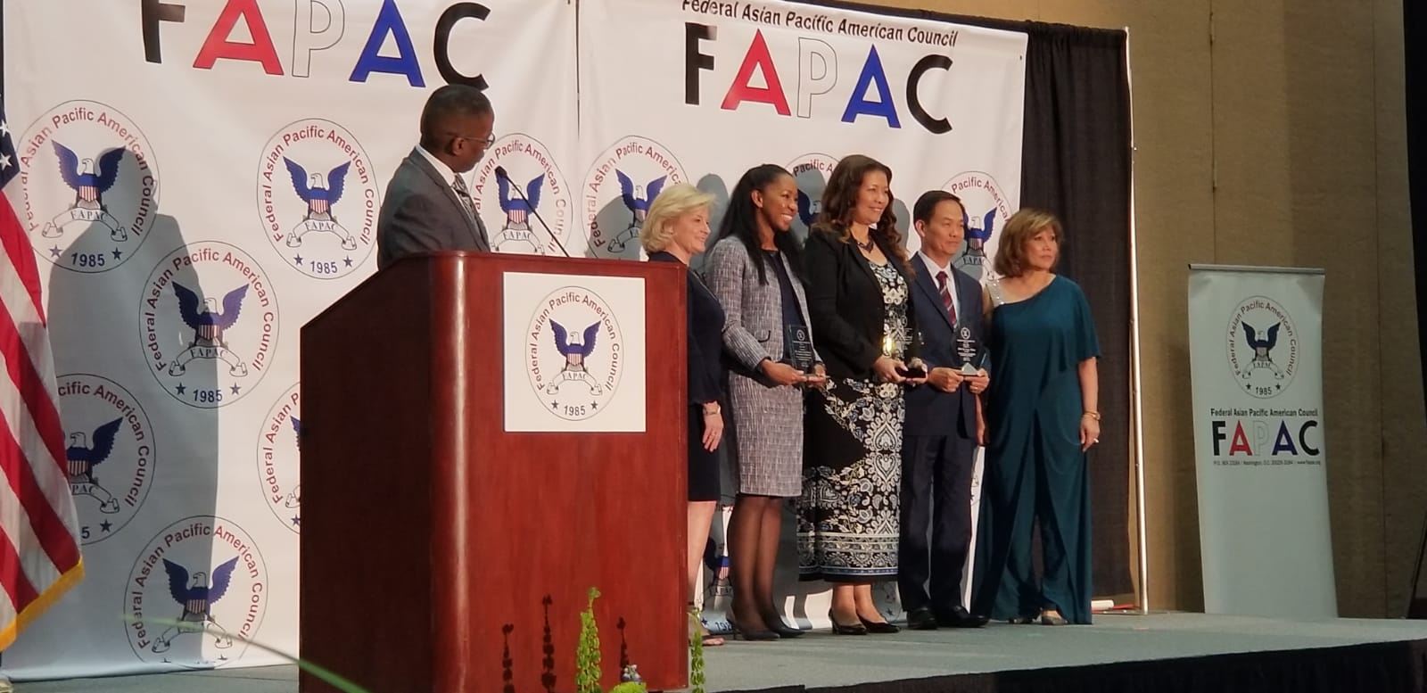 Tony Pham joins other award recipients on stage after receiving the Federal Asian Pacific American Council (FAPAC) Civilian Award for Oustanding Individual Leadership.  
