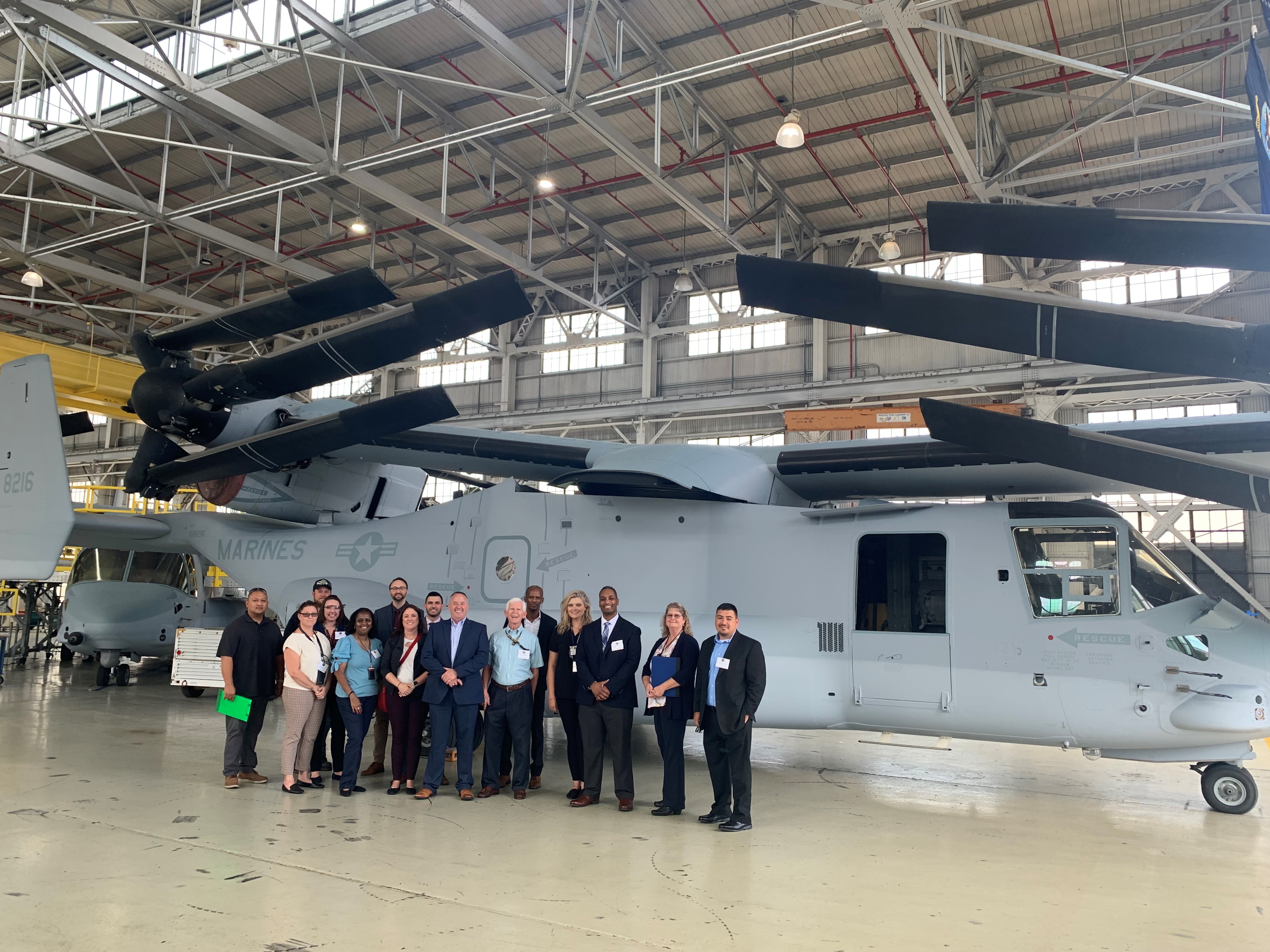 Participants from the NAVAIR Leadership Development Program 2020 cohort shown in the MV-22 Osprey hanger at Fleet Readiness Center Southwest, Naval Air Station North Island