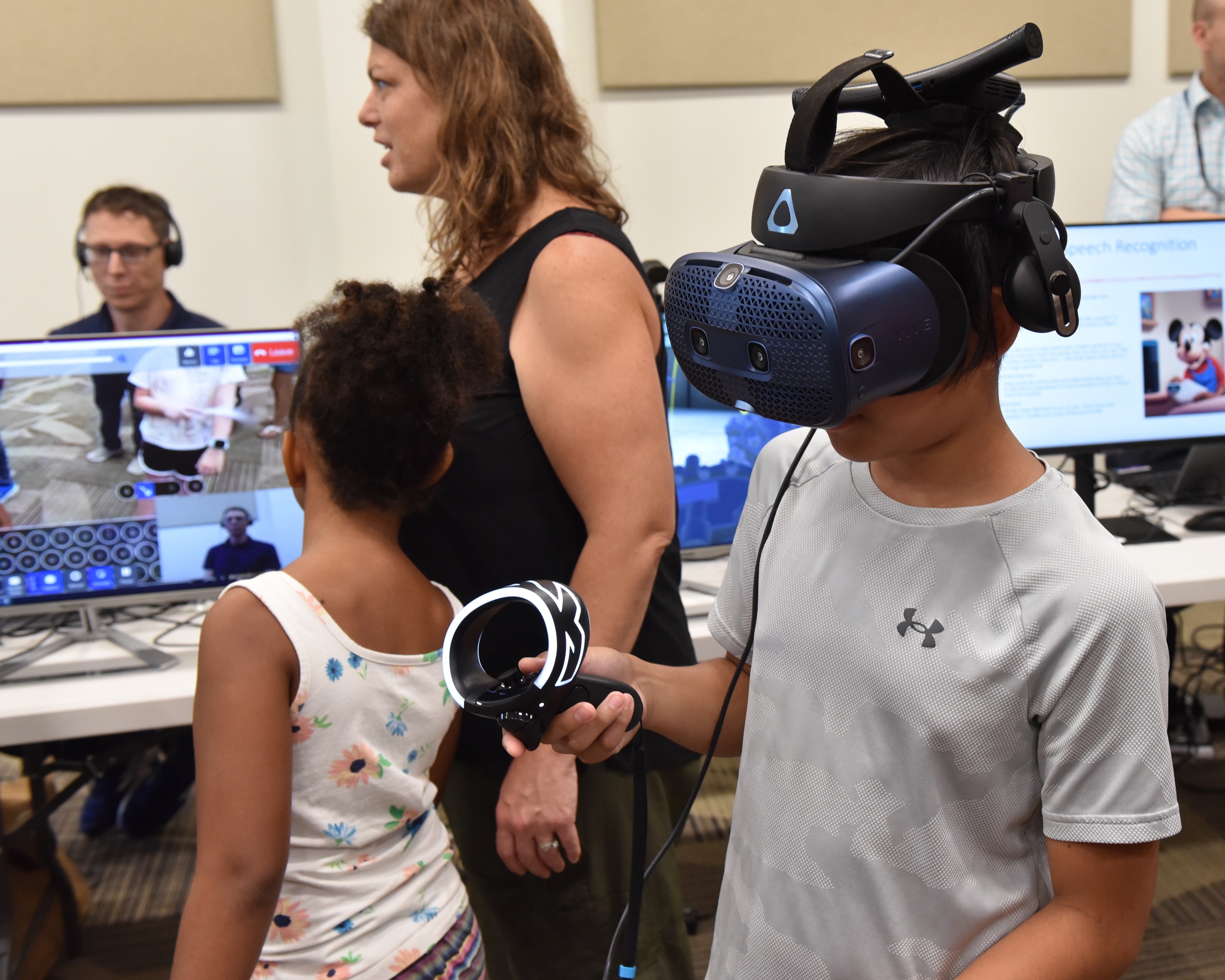 NAWCAD Lakehurst Family Day participant tests augmented reality system