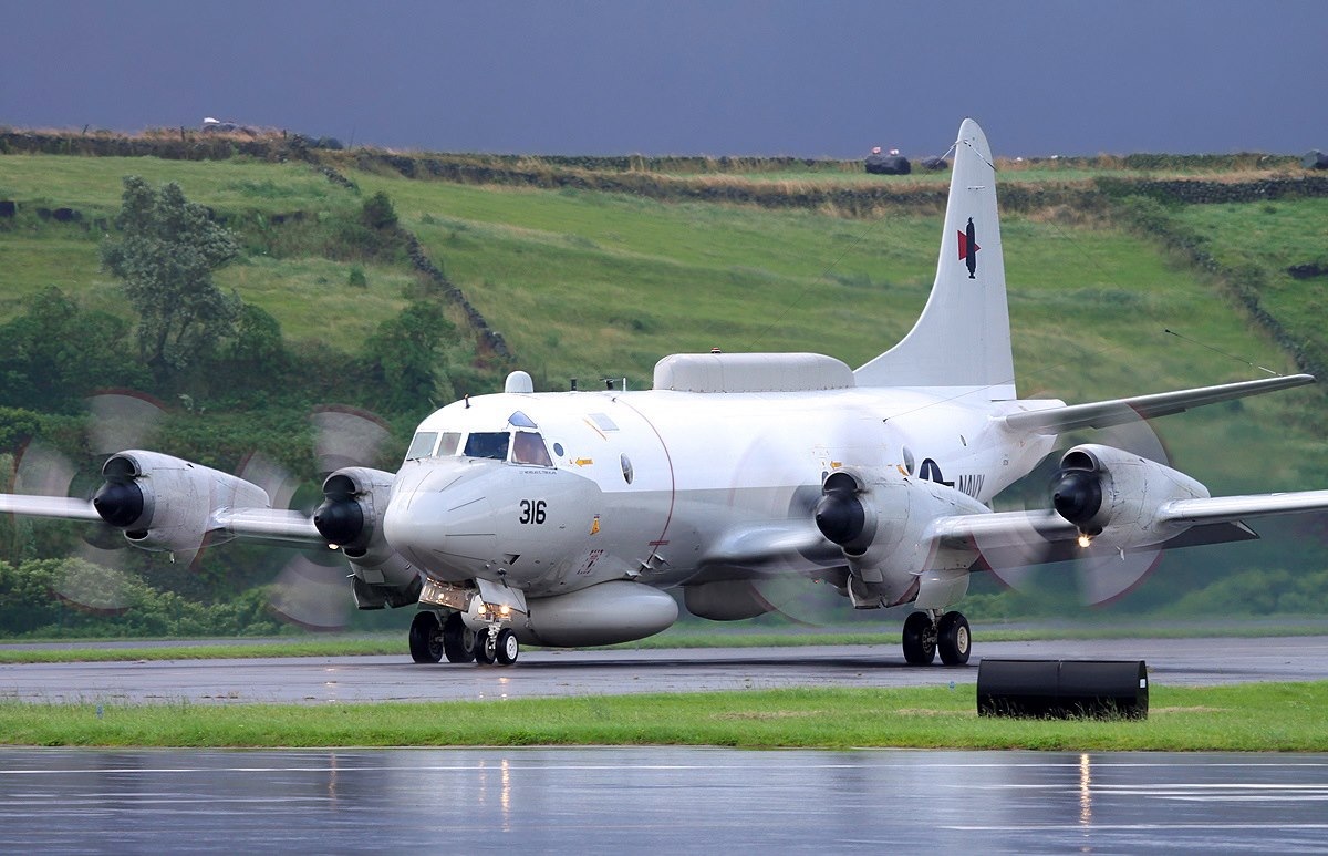 EP-3 Aries takes off from a runway. 