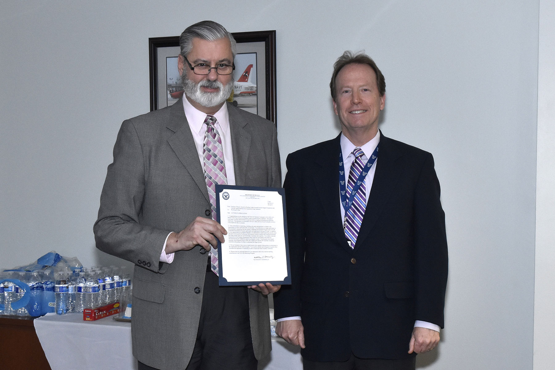 Lakehurst Mentor of the Year Brian Barr receives his certificate from Technical Director Jack Martenak