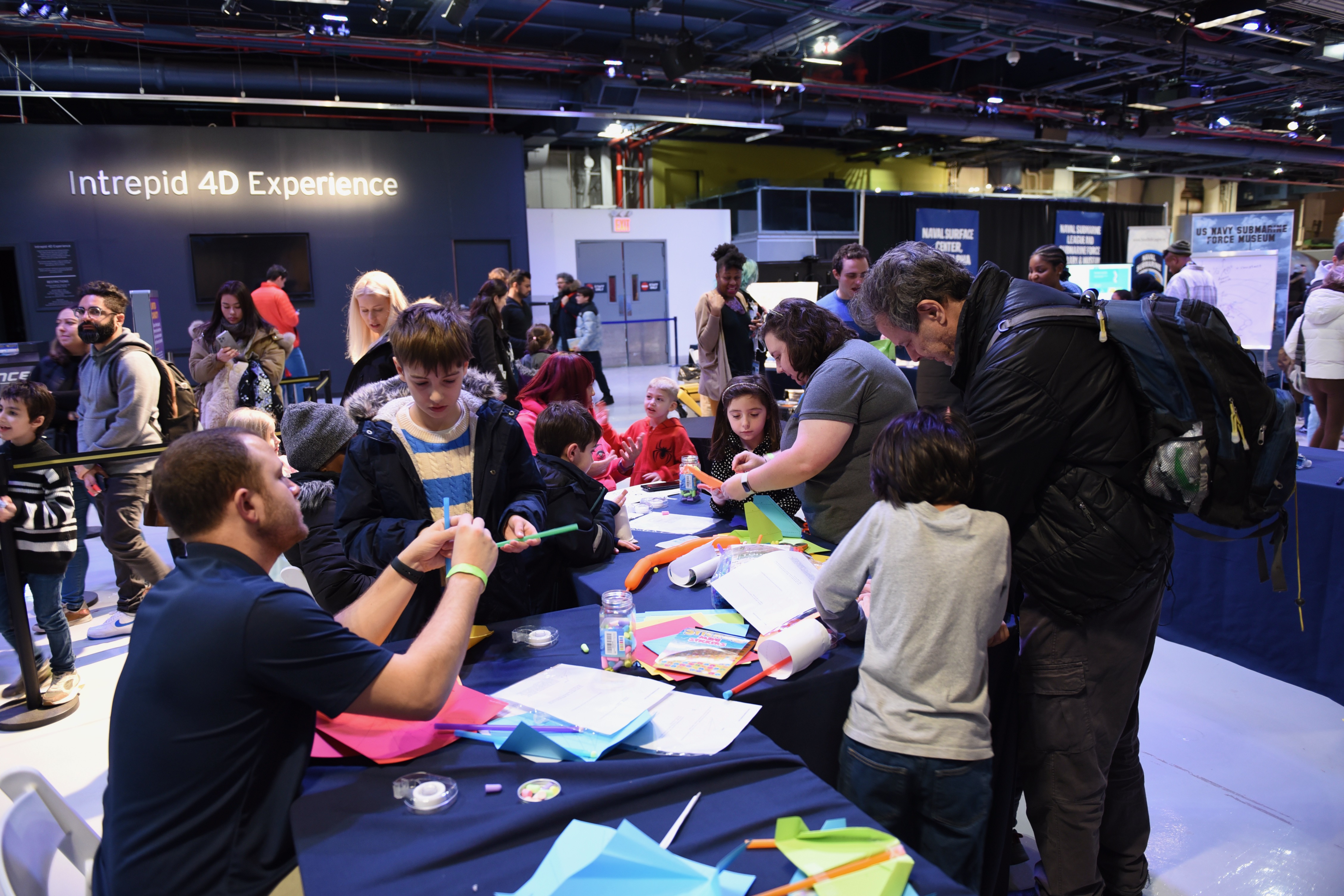 Team Members from Naval Air Warfare Center Aircraft Division Lakehurst take part in Kids Week at the Intrepid Museum