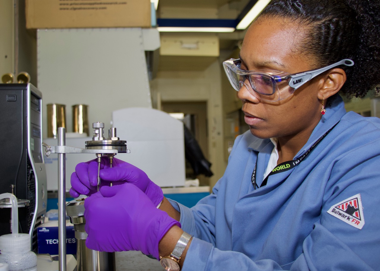 Dr. Josanne Woodroffe, a research chemist at Naval Air Warfare Center Weapons Division, measures the heat of combustion of a fuel sample on Feb. 28 at China Lake.