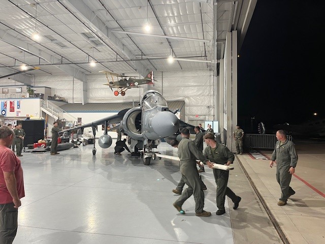Parking Harrier AV-8B II+ in hangar