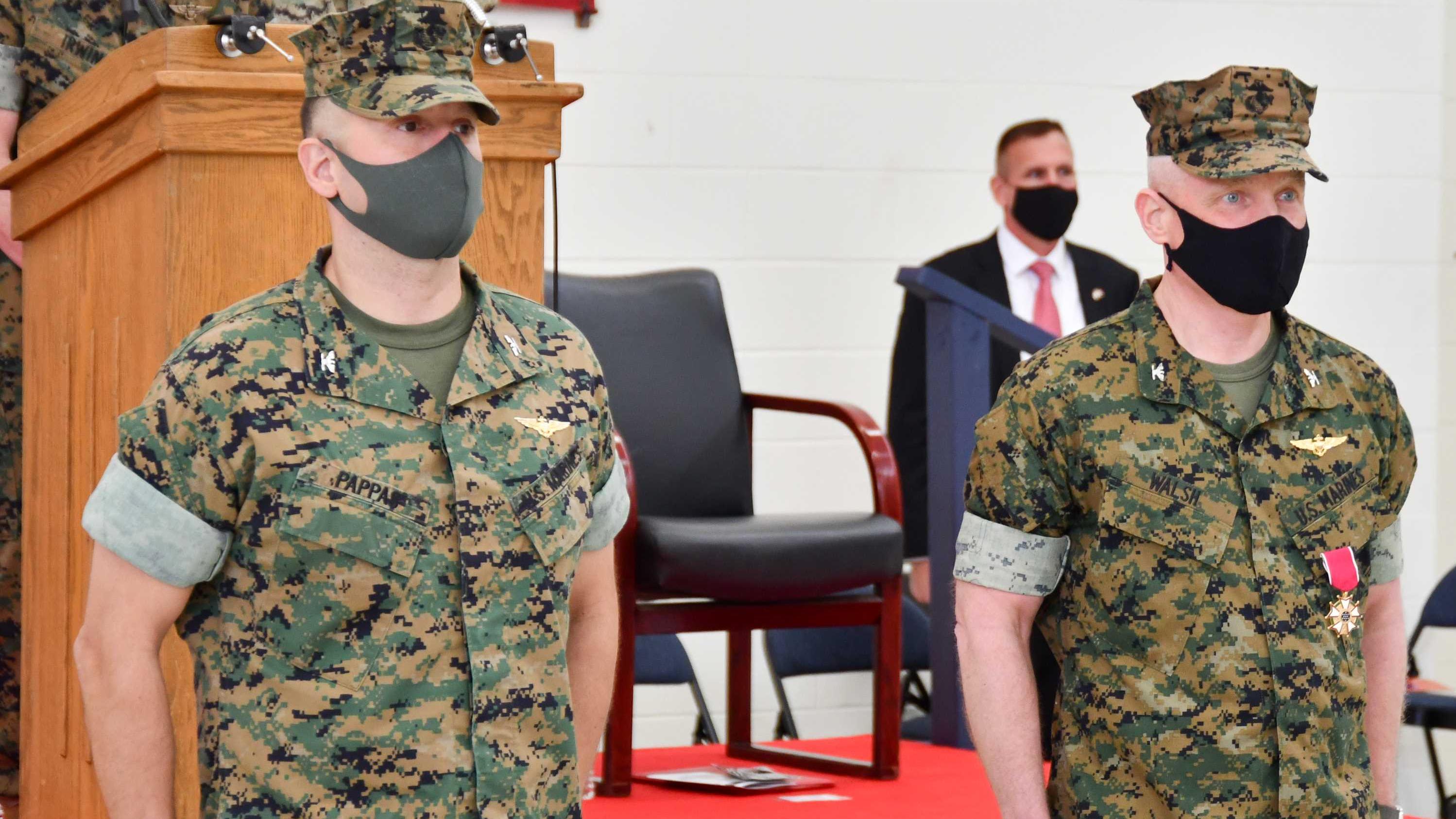 Col. Vasilios E. Pappas, left, and Col. David C. Walsh, right, following the transfer of leadership of PMA-276