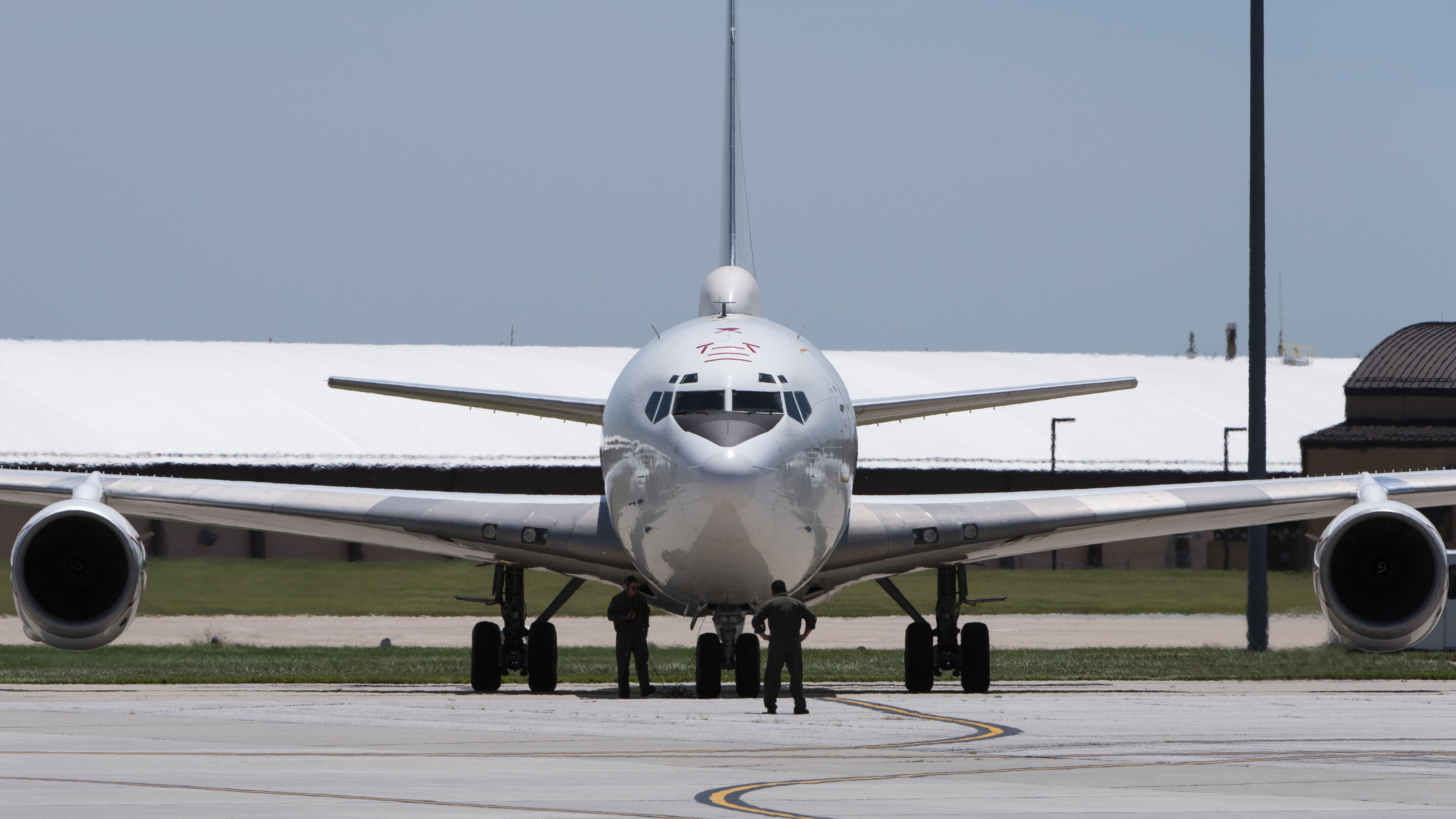 A U.S. Navy E-6B Mercury aircraft receives post-flight maintenance after landing at Offutt AFB, Nebraska.