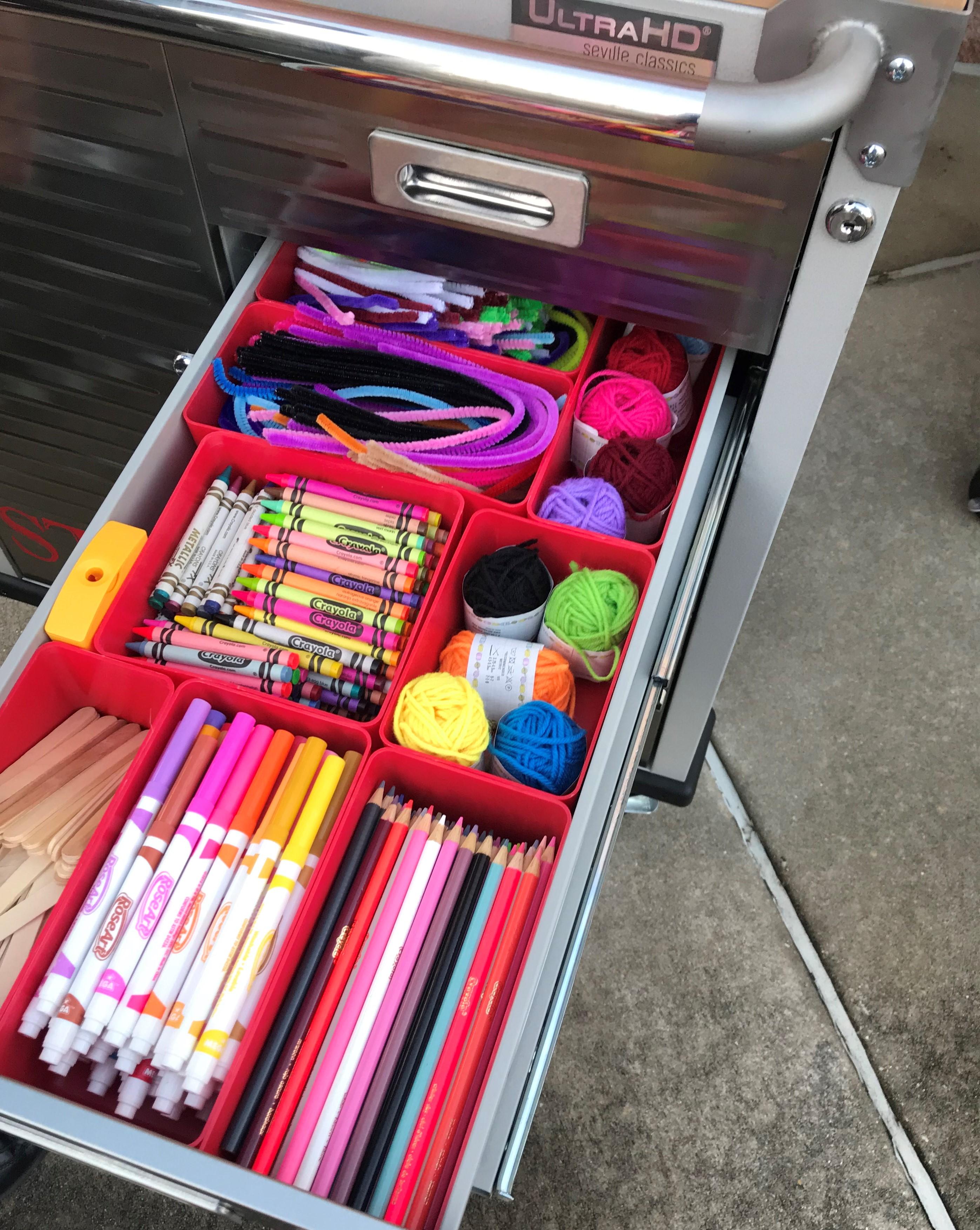 School supplies in cart drawer