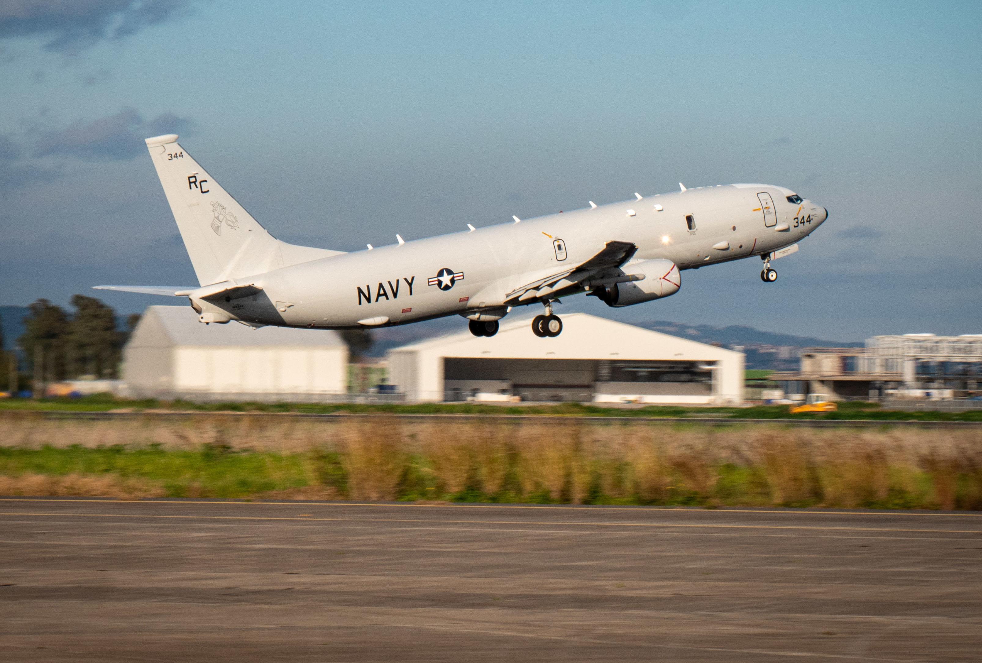  P-8A Poseidon maritime patrol aircraft, assigned to the "Grey Knights" of Patrol Squadron (VP) 46, takes off for its mission, Jan. 23, 2021.