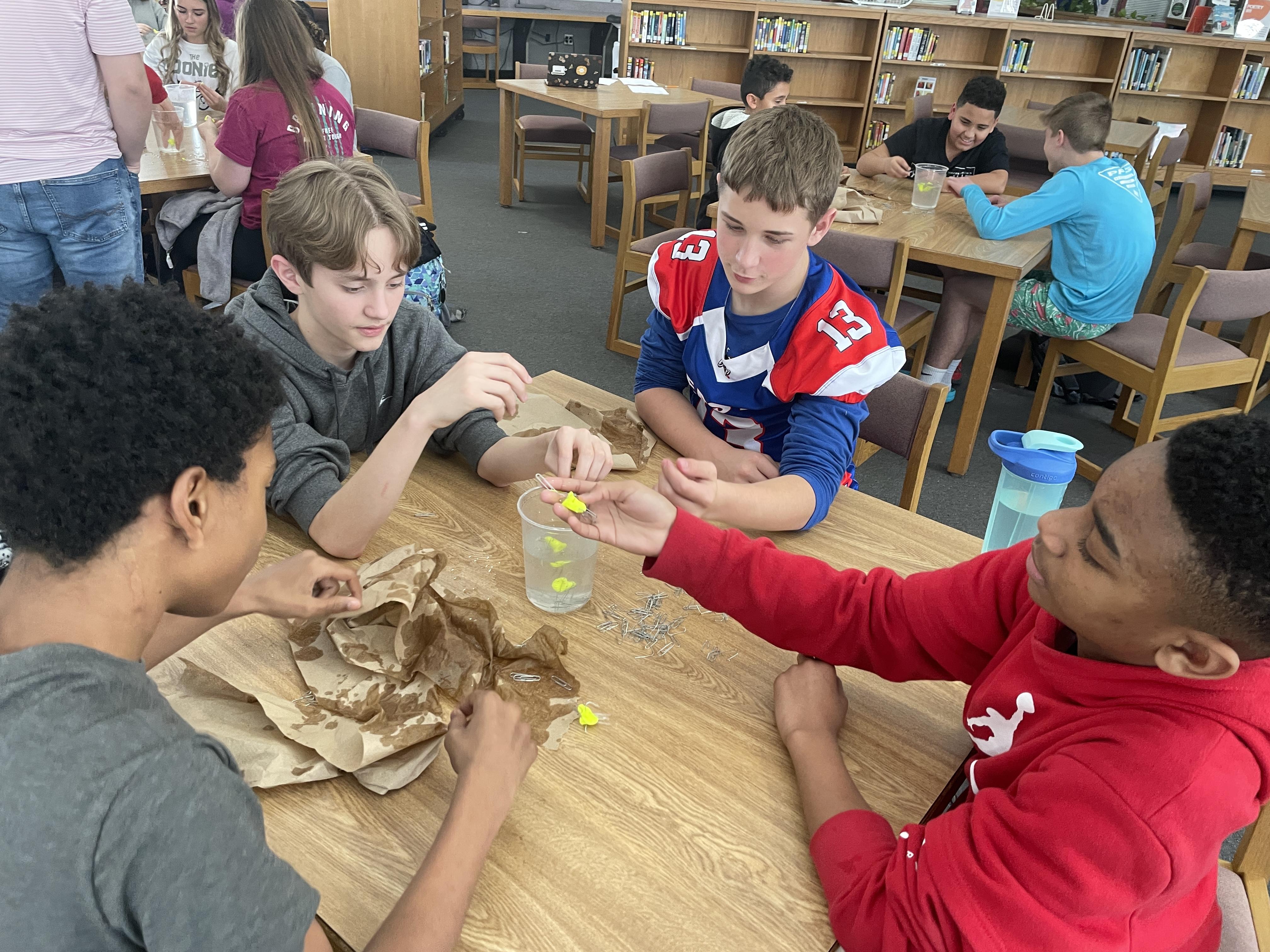 Students at Tucker Creek Middle School take part in an engineering design challenge during a visit by engineers from Fleet Readiness Center East (FRCE). The visit was part of the depot’s National Engineers Week outreach efforts, which saw FRCE engineers visiting four elementary schools, 18 middle schools and four high schools in Eastern North Carolina and engaging with more than 2,700 area students. 