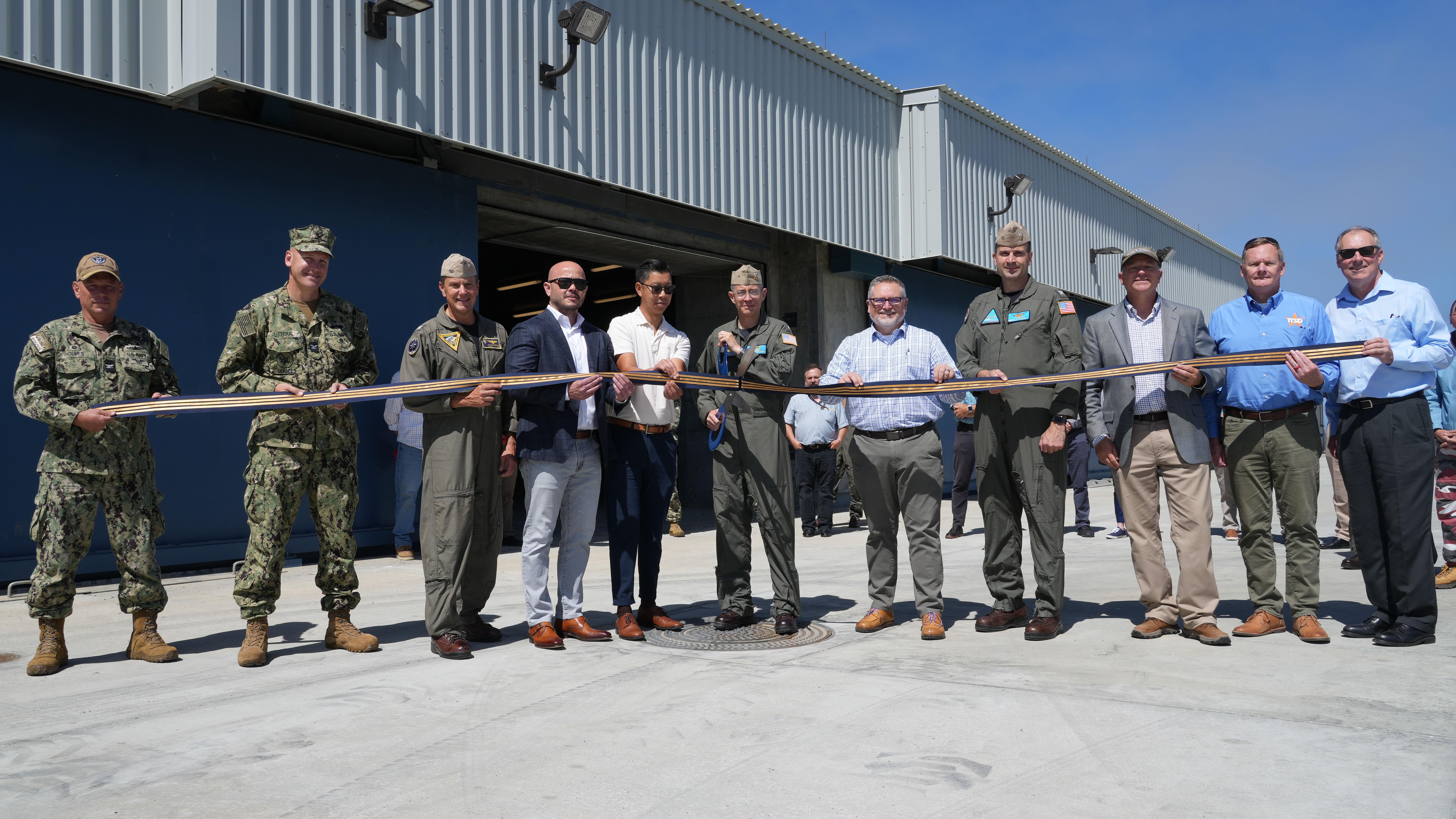 Navy leaders and contracting partners cut the ribbon on a new high explosive magazine on San Nicolas Island, located off the coast of Southern California in the Point Mugu Sea Range, on Aug. 20, 2025. (U.S. Navy photo by Tim Gantner)