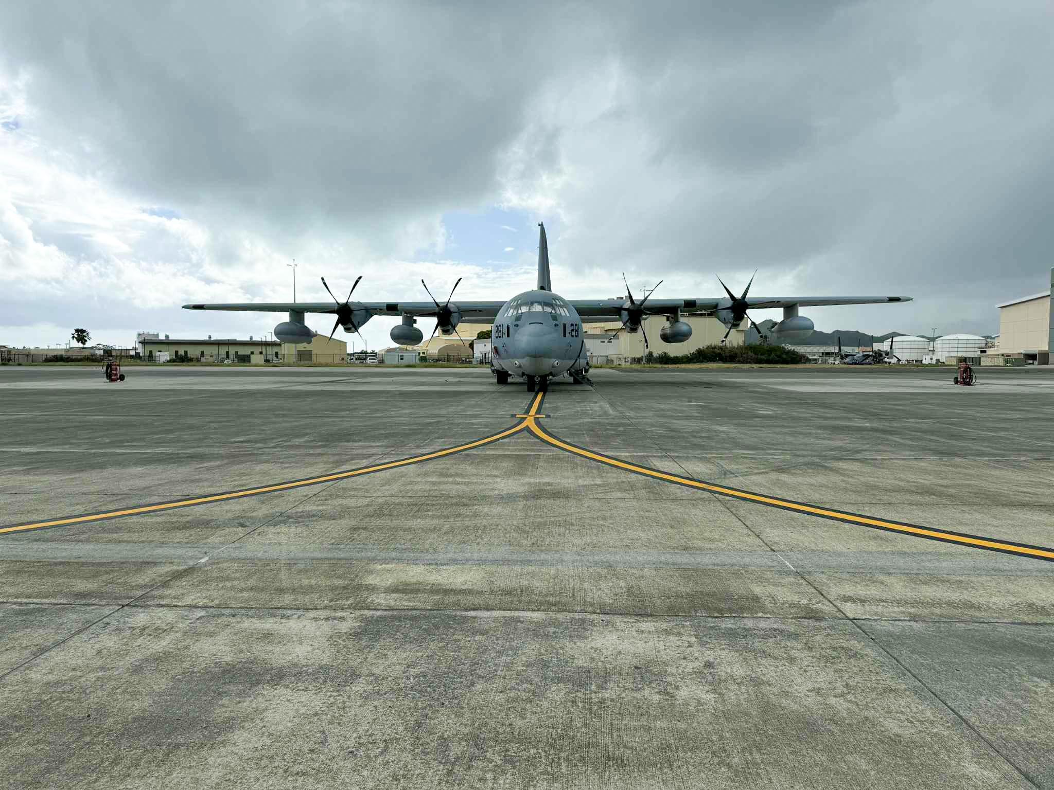 Front of a grey C-130 aircraft 