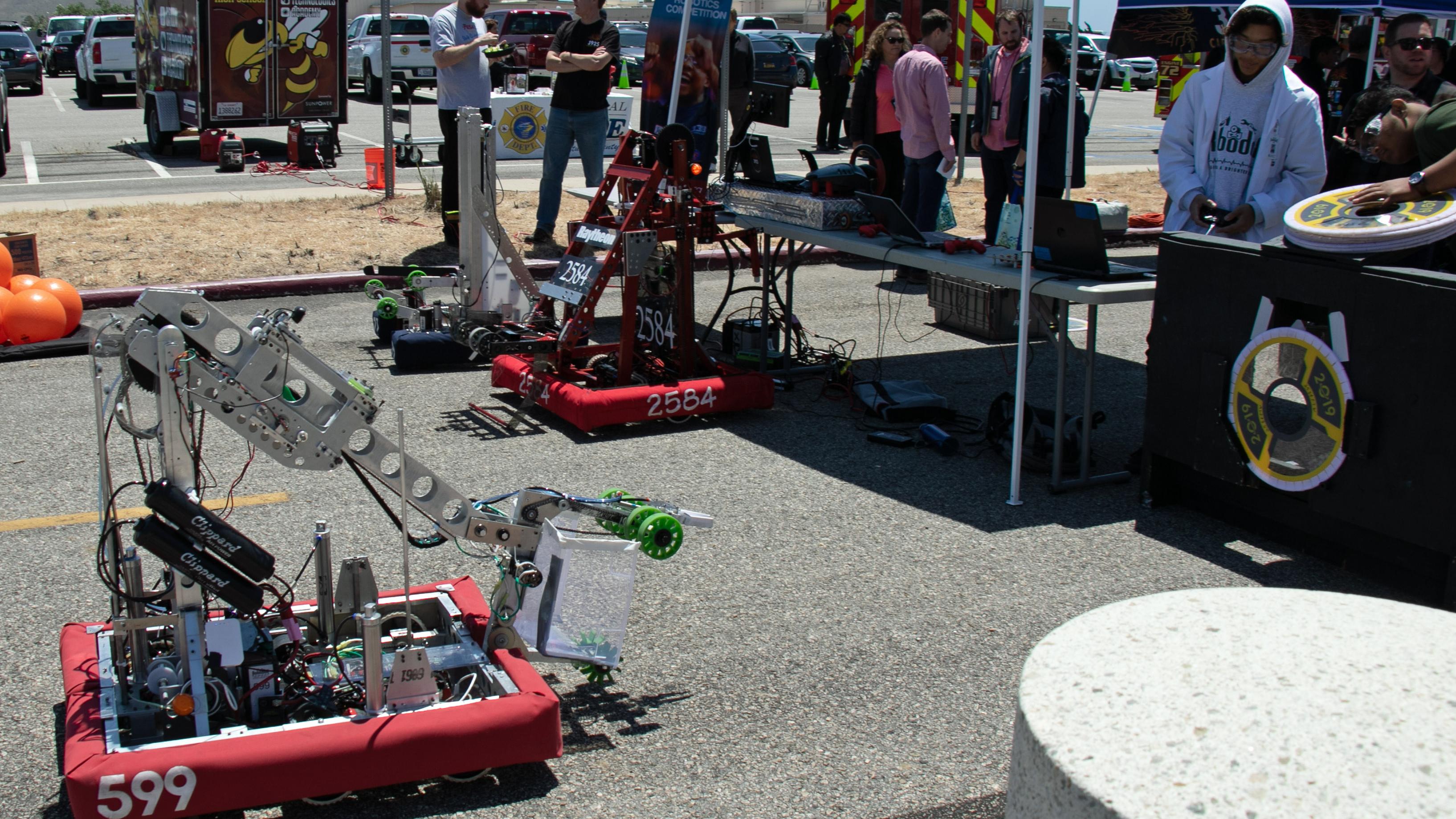 A FIRST Robotics participant pilots his team’s robot creation during the 2019 Point Mugu Command Thank You event. (U.S. Navy photo by Kimberly Brown)