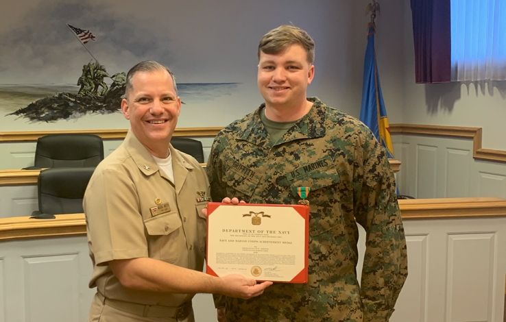 FRCE commanding officer presents certificate to depot's Marine of Year 